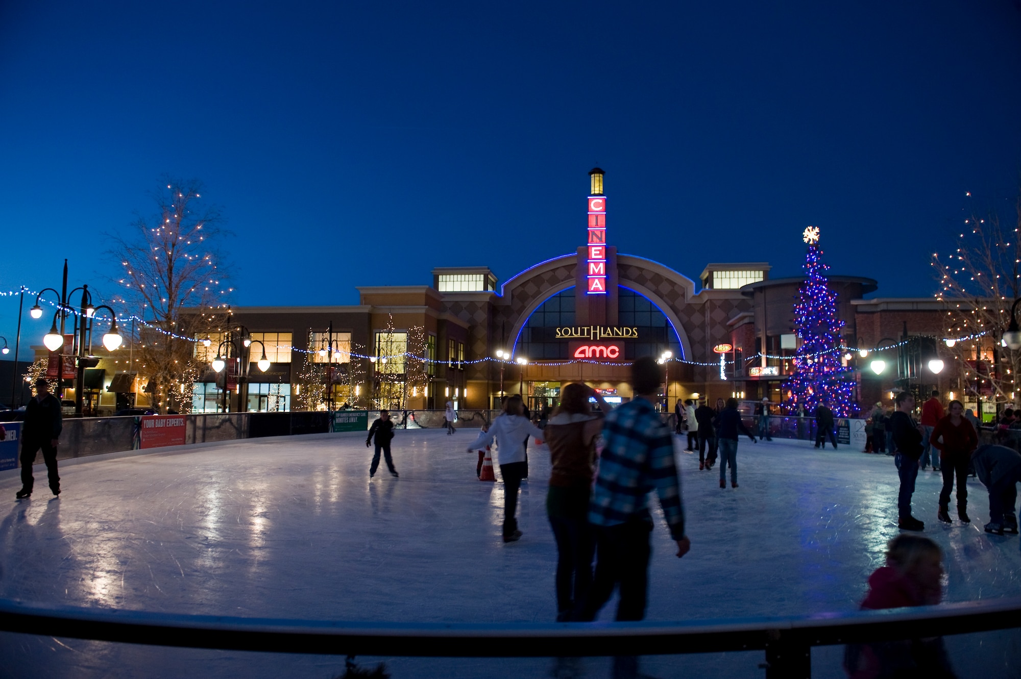 AURORA, Colo. – Skaters glide across the Southlands Shopping Center’s ice skating pond, Nov. 20, 2012, in front of the cinema. Operating hours for the pond are 4 to 9 p.m. weekdays, 11 a.m. to 10 p.m. Saturdays and 11 a.m. to 7 p.m. Sundays. (U.S. Air Force photo by Airman 1st Class Riley Johnson)