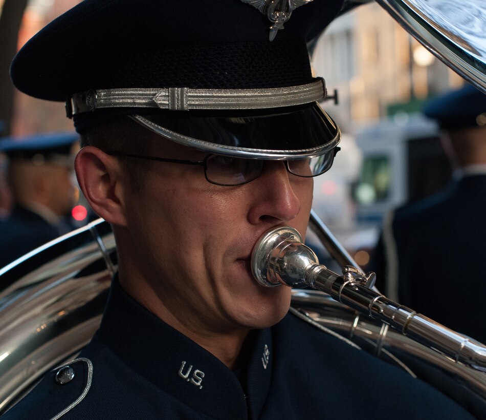 U.S. Air Force Band member, performs with the band during the 86th Annual Macy's Thanksgiving Day Parade, Nov. 22, 2012, in New York City. Two hundred Airmen from the USAF Band and Honor Guard marched in the parade with a televised audience of 55 million viewers. (U.S. Air Force photo by Senior Airman Perry Aston)
