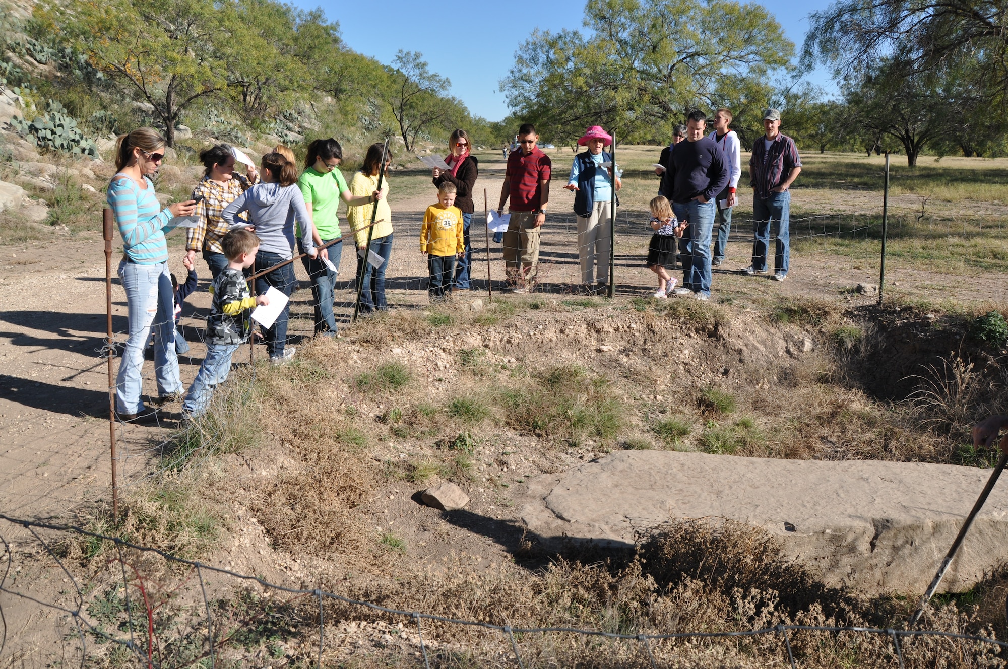PAINT ROCK, Texas – The tour group gathers around a rock at Paint Rock Nov. 24. The rock was believed to be used by Native Americans for Winter Solstice ceremonies. (U.S. Air Force Photo/ Airman 1st Class Joshua Edwards)