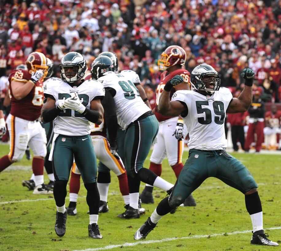 Philadelphia Eagles linebacker, DeMeco Ryans, celebrates on the field during a game versus the Washington Redskins at FedEx in Landover, Md.,Nov. 18, 2012. The Redskins defeted the Eagles 31-6. More than 25 Air Force District of Washington Airmen were selected to be honored for their service by the National Football League and the Washington Redskins as part of United Serviceman's Automobile Association's, "Salute to Service." (U.S. Air Force photo/Airman 1st Class Erin O’Shea)

