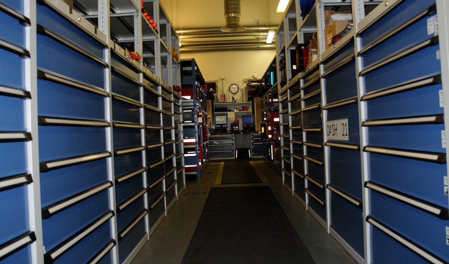 Tool boxes and storage containers line the 100th Aircraft Maintenance Squadron maintenance sortie support section Nov. 27, 2012, at RAF Mildenhall, England. The maintenance sortie support section maintains and manages inventory lists of all tools and test equipment in the 100th Maintenance Group. (U.S. Air Force photo by Gina Randall/Released) 