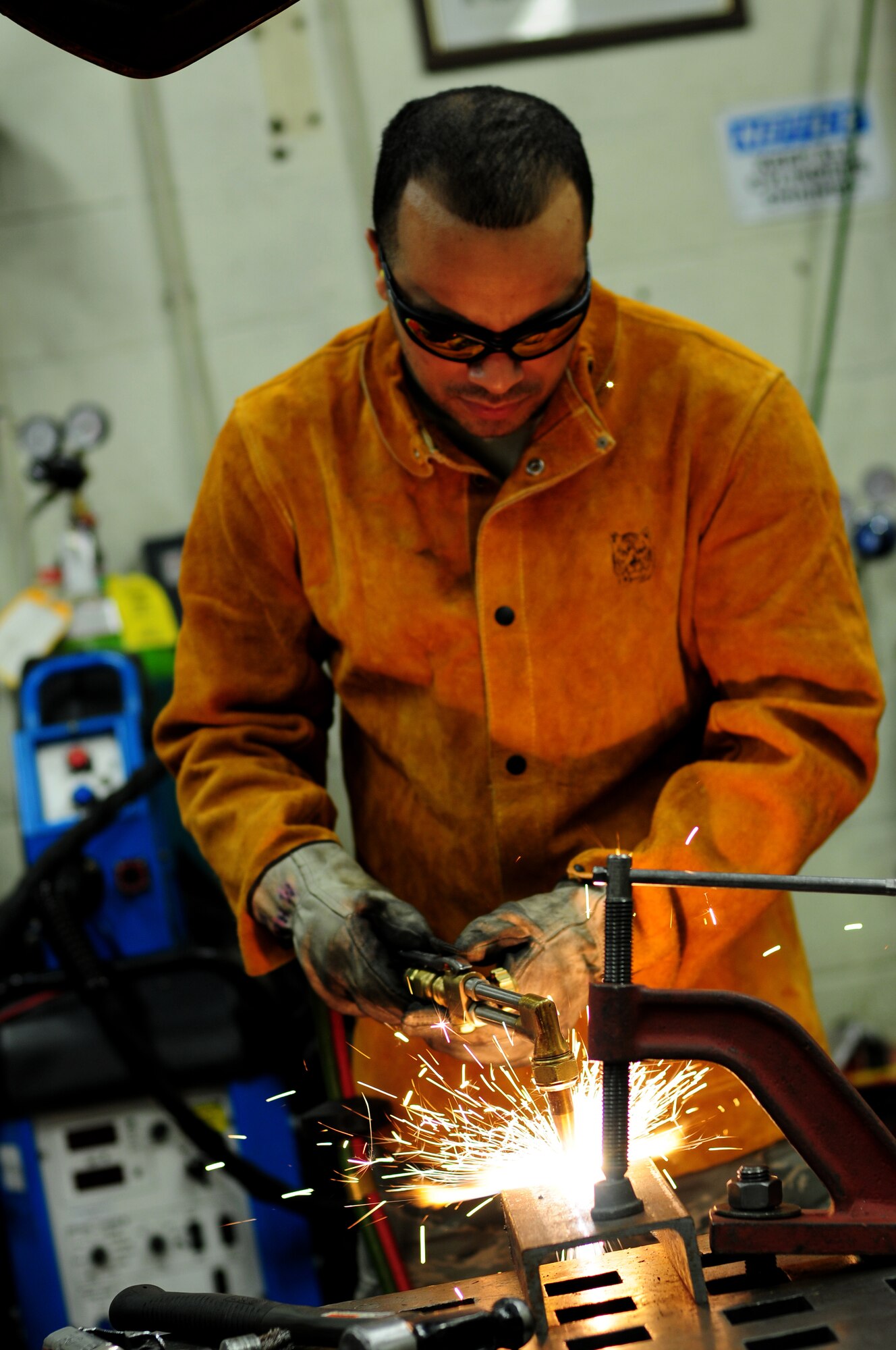 ROYAL AIR FORCE LAKENHEATH, England – Staff Sgt. Michael Hooper, 48th Equipment Maintenance Squadron metals technology craftsman, welds using an oxy-acetylene cutting torch Nov. 20, 2012. The 48th EMS metals technology shop’s mission is to function as the U.S. Air Force’s welders by fabricating or repairing aircraft and ground equipment components. (U.S. Air Force photo by Airman 1st Class Cory D. Payne)