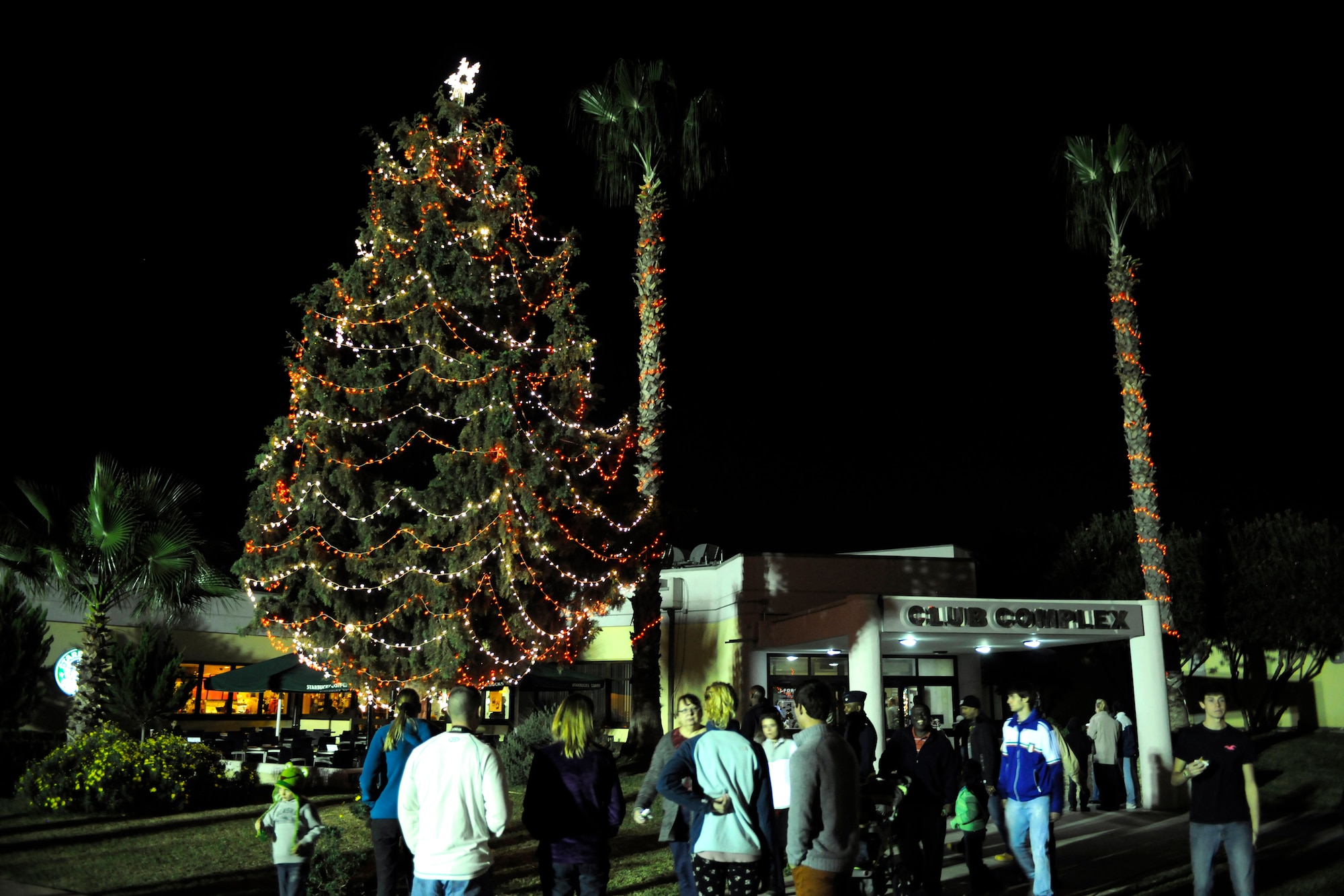 The Incirlik holiday tree is displayed outside of the club complex after the tree lighting ceremony Nov. 26, 2012, at Incirlik Air Base, Turkey. During the ceremony, a children’s choir from the Incirlik Unit School performed, Santa Claus arrived on a fire truck, and free snacks were given to attendees. (U.S. Air Force photo by Tech. Sgt. Dallas Edwards/Released)