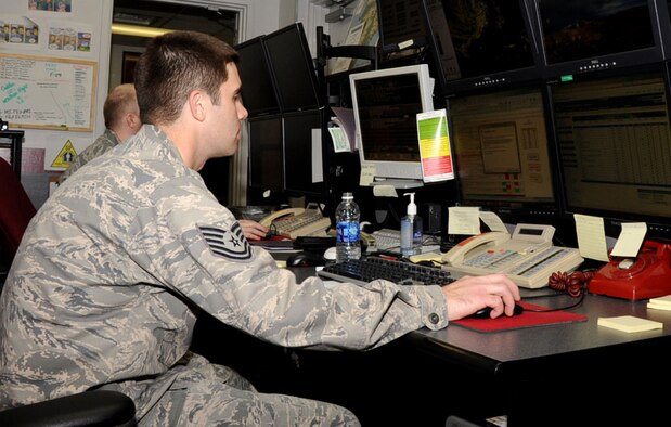 U.S. Air Force Tech. Sgt. Steve Fanis, 35th Operations Support Squadron weather forecaster, checks the weather forecast during Keen Sword 2013 at Misawa Air Base, Japan, Nov. 8, 2012. Weather flight personnel briefed pilots face-to-face to ensure they had the most up-to-date weather conditions as part of the joint bilateral flying operations conducted during the exercise. (U.S. Air Force photo by Airman 1st Class Kenna Jackson)