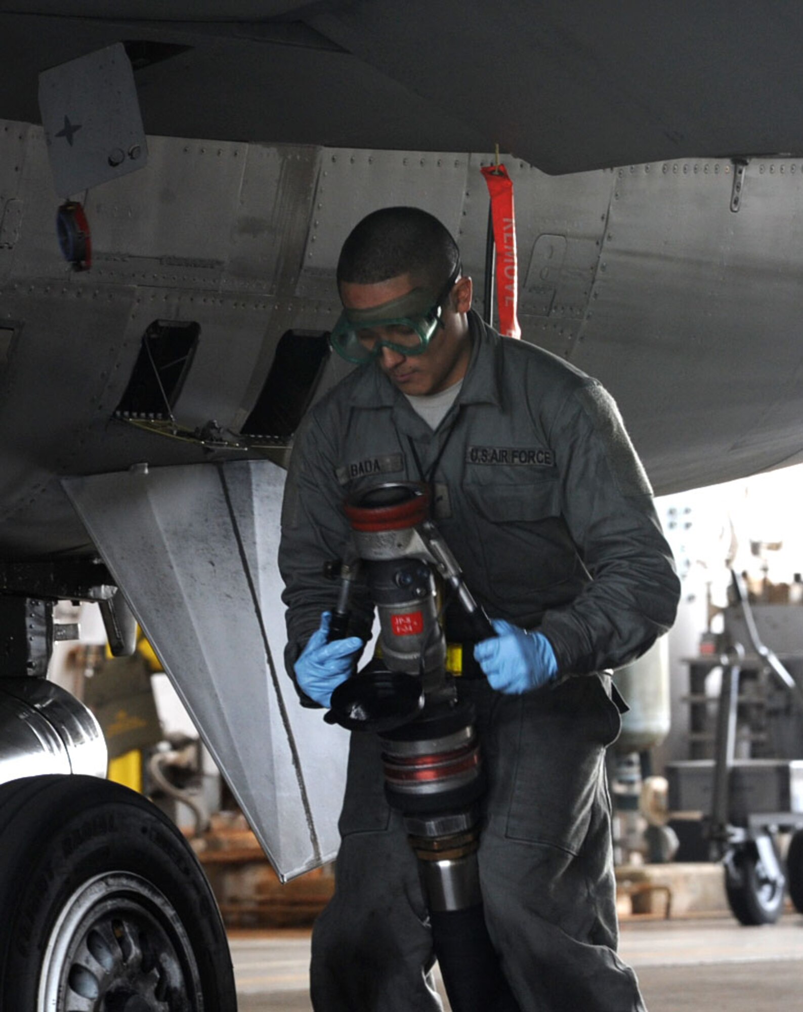 U.S. Air Force Airman 1st Class Geanny Bada, 14th Aircraft Maintenance Unit crew chief, refuels an F-16 Fighting Falcon aircraft during Keen Sword 2013 at Misawa Air Base, Japan, Nov. 8, 2012. The biennial exercise builds builateral confidence and strengthens working relationships between the U.S. and Japan’s military forces. (U.S. Air Force photo by Airman 1st Class Kenna Jackson)