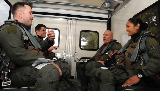 Four pilots from the 35th Fighter Wing are transported to their F-16 Fighting Falcon aircraft they will be flying during Keen Sword 2013 at Misawa Air Base, Japan, Nov. 8, 2012. The exercise is scheduled for Nov. 5-16 and is the twelfth joint-bilateral field training exercise since 1986 involving U.S. military and Japan Self-Defense Forces. (U.S. Air Force photo by Airman 1st Class Kenna Jackson)