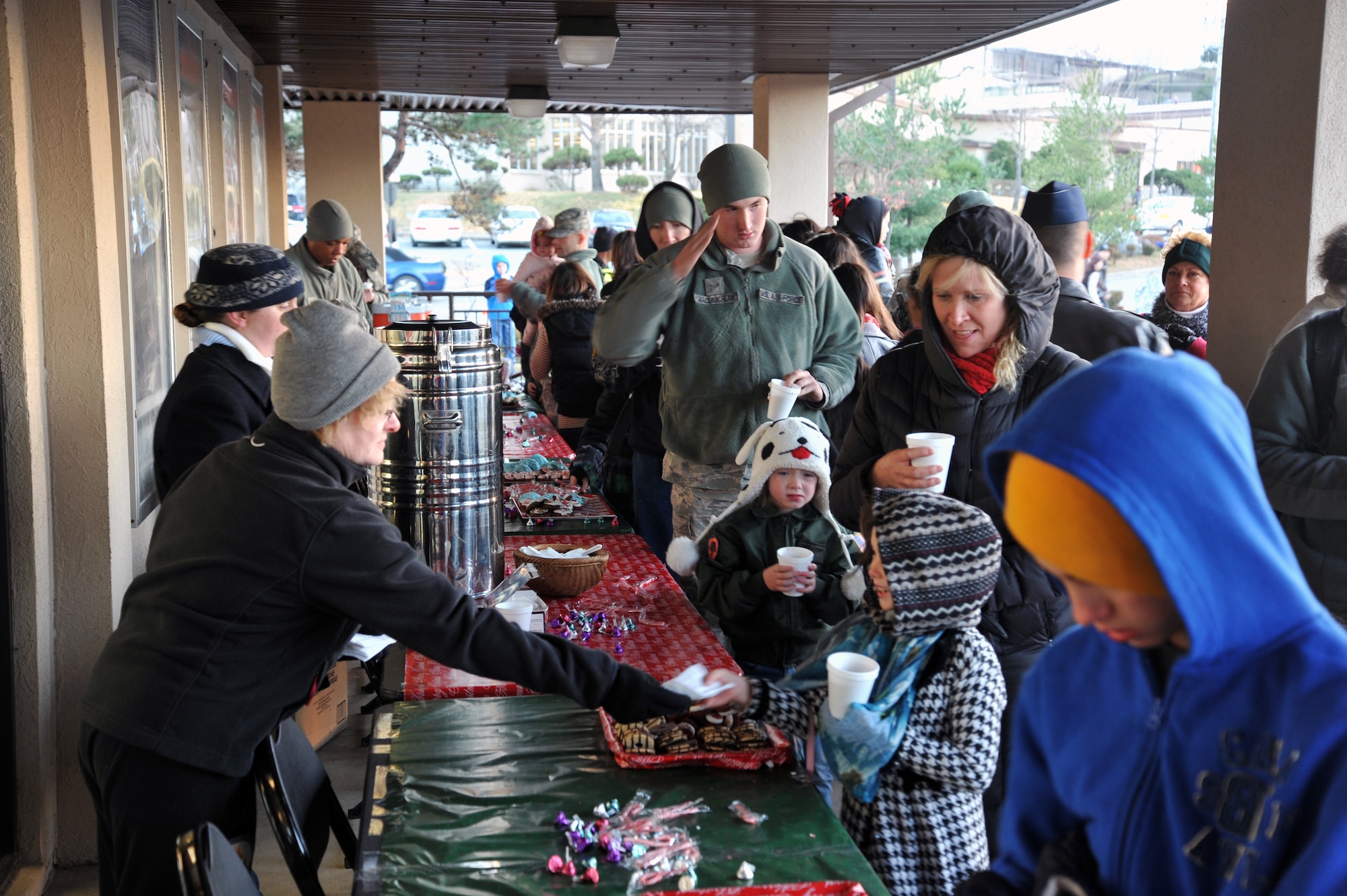 Hot chocolate and cookies were provided free of charge for the annual tree lighting ceremony at Osan Air Base, Republic of Korea, Nov. 26, 2012. The event also included music performances by Osan American Elementary School students. (U.S. Air Force photo/Staff Sgt. Craig Cisek)