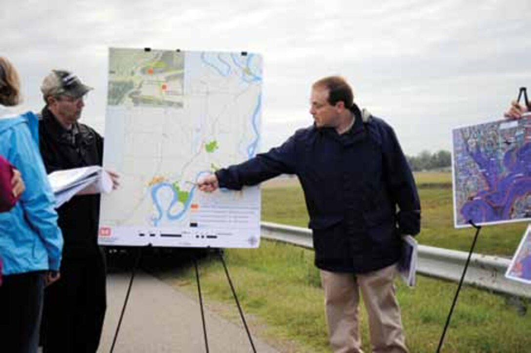 Project Manager Danny Ward points out a feature of the St. Johns Bayou and New Madrid Floodway Project during a stop near the 1,500’ gap in the St. Johns Bayou water control structure.