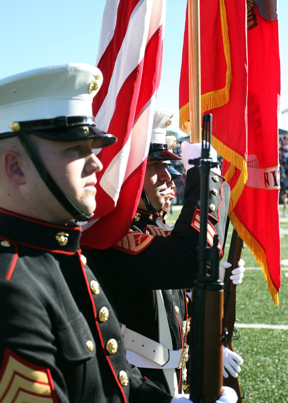 Marines with Recruiting Station Montgomery, AL, present the colors at the Troy vs Navy game November 10 at Troy University.