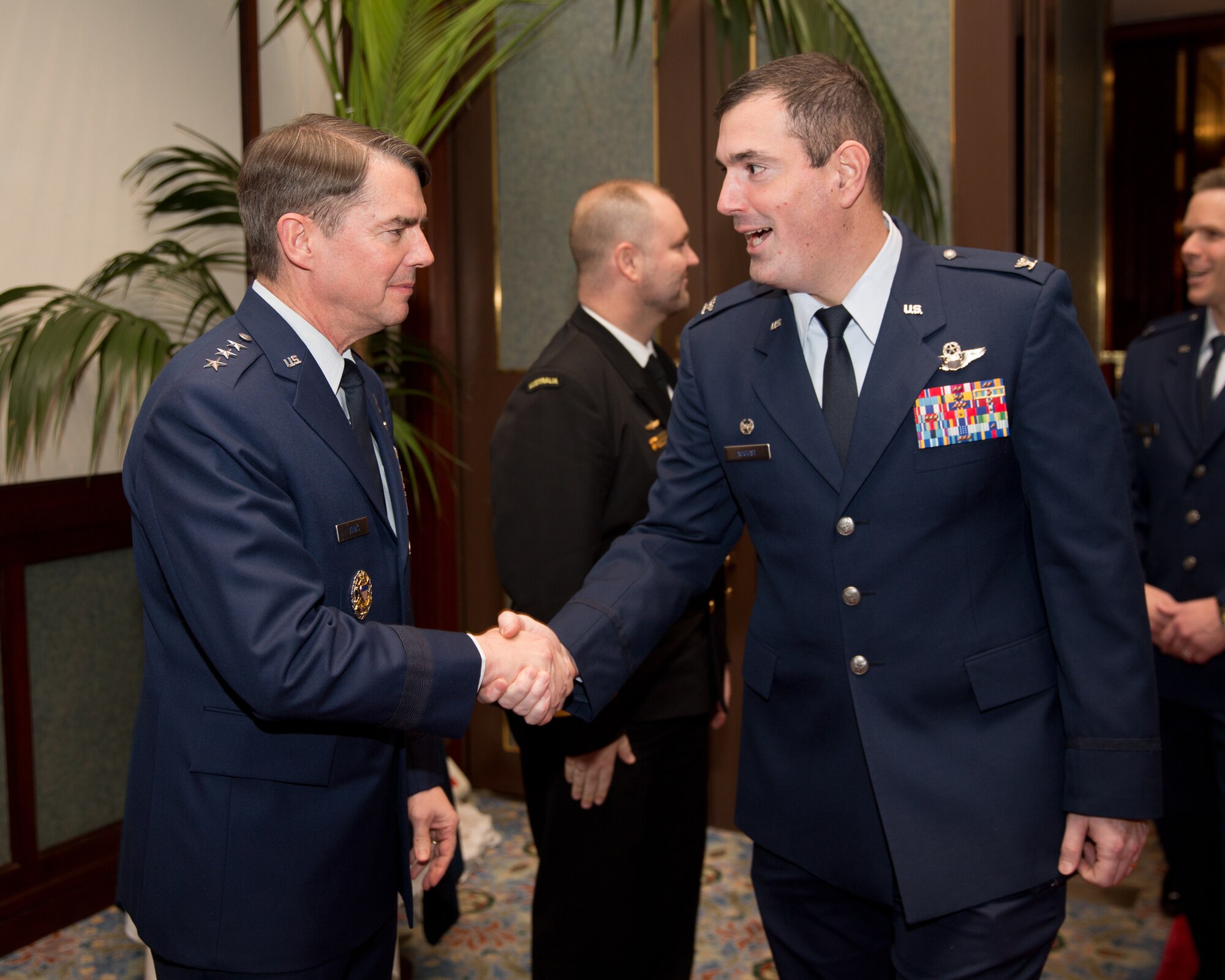 TOKYO, Japan -- (from left to right) U.S. Air Force Lt. Gen. Jan-Marc Jouas, United Nations Command Korea, deputy commander, U.S. Forces Korea, deputy commander, Air Component Command, Republic of Korea/U.S. Combined Forces Command, commander, 7th Air Force, commander, greets U.S. Air Force Col. Mark August, 374th Airlift Wing commander, during the 67th Anniversary of the United Nations, Nov. 29, 2012 at New Sanno Hotel. The United Nations Command was established by UN Security Council Resolution 84 on July 7, 1950 in Tokyo. The command continues to support the Korean Armistice Agreement which was signed July 27, 1953, ending open hostilities. (U.S. Air Force photo by Osakabe Yasuo)