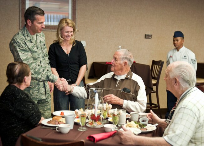 U.S. Air Force Col. Barry Cornish, 99th Air Base Wing commander and his wife, Missy, greet and thank retired military patrons for their service during the Nellis annual Thanksgiving lunch Nov. 22, 2012 at Nellis Air Force Base, Nev.  Each year Nellis invites retirees and their families to dine at the base dining facility for Thanksgiving lunch and dinner. (U.S. Air Force photo by Lawrence Crespo)