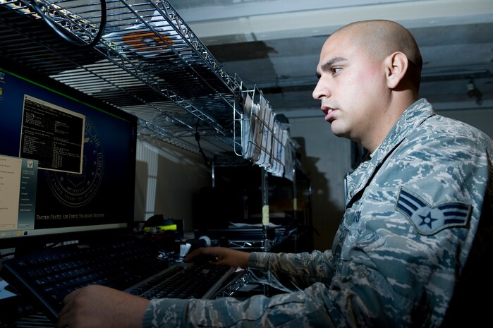Senior Airman Louis Rodridguez, 99th Communications Squadron client system technician, checks network connectivity on a customer?s computer Nov. 26, 2012, at Nellis Air Force Base, Nev. The 99th Communications Squadron manages more than 14,000 users at Nellis AFB. (U.S. Air Force photo by Airman 1st Class Christopher Tam)
