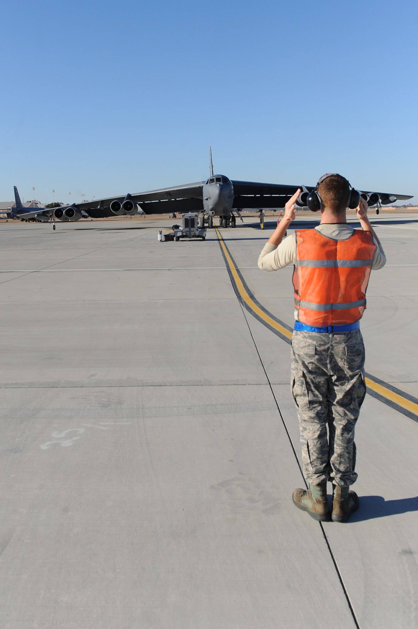 A B-52H Stratofortress taxis in after an orientation flight on Barksdale Air Force Base, La., Nov. 28. The flight was for John Atkins, Shreveport-Bossier Military Affairs Council president. The purpose of the orientation flight was to provide a deeper understanding of the full spectrum of Air Force Global Strike Command and an appreciation for the quality Airmen and civilians who protect the nation every day. (U.S. Air Force photo Senior Airman Micaiah Anthony)
