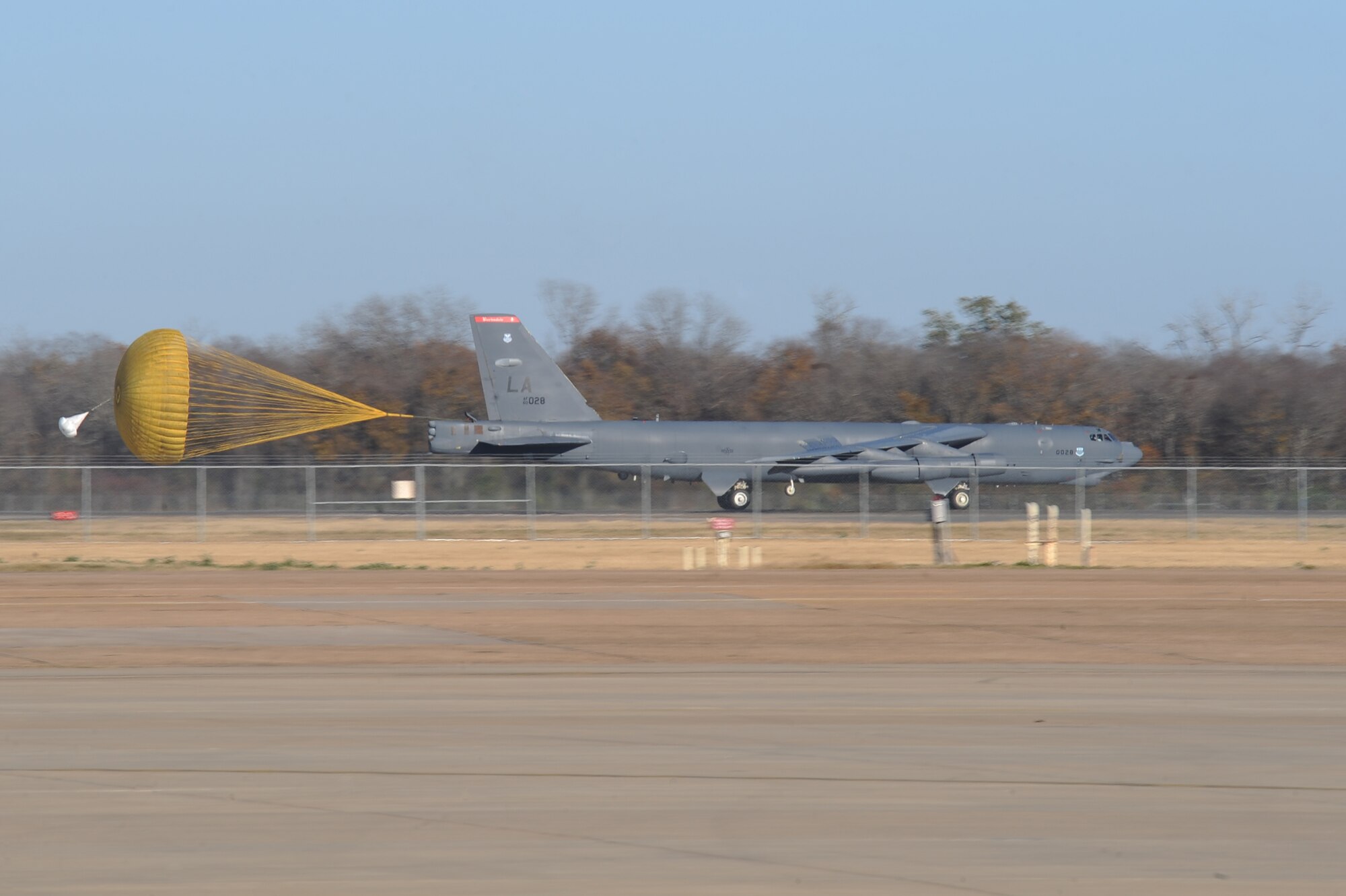 A B-52H Stratofortress deploys its drag chute after an orientation flight on Barksdale Air Force Base, La., Nov. 28. The flight was for John Atkins, Shreveport-Bossier Military Affairs Council president. The purpose of the orientation flight was to provide a deeper understanding of the full spectrum of Air Force Global Strike Command and an appreciation for the quality Airmen and civilians who protect the nation every day. (U.S. Air Force photo Senior Airman Micaiah Anthony)