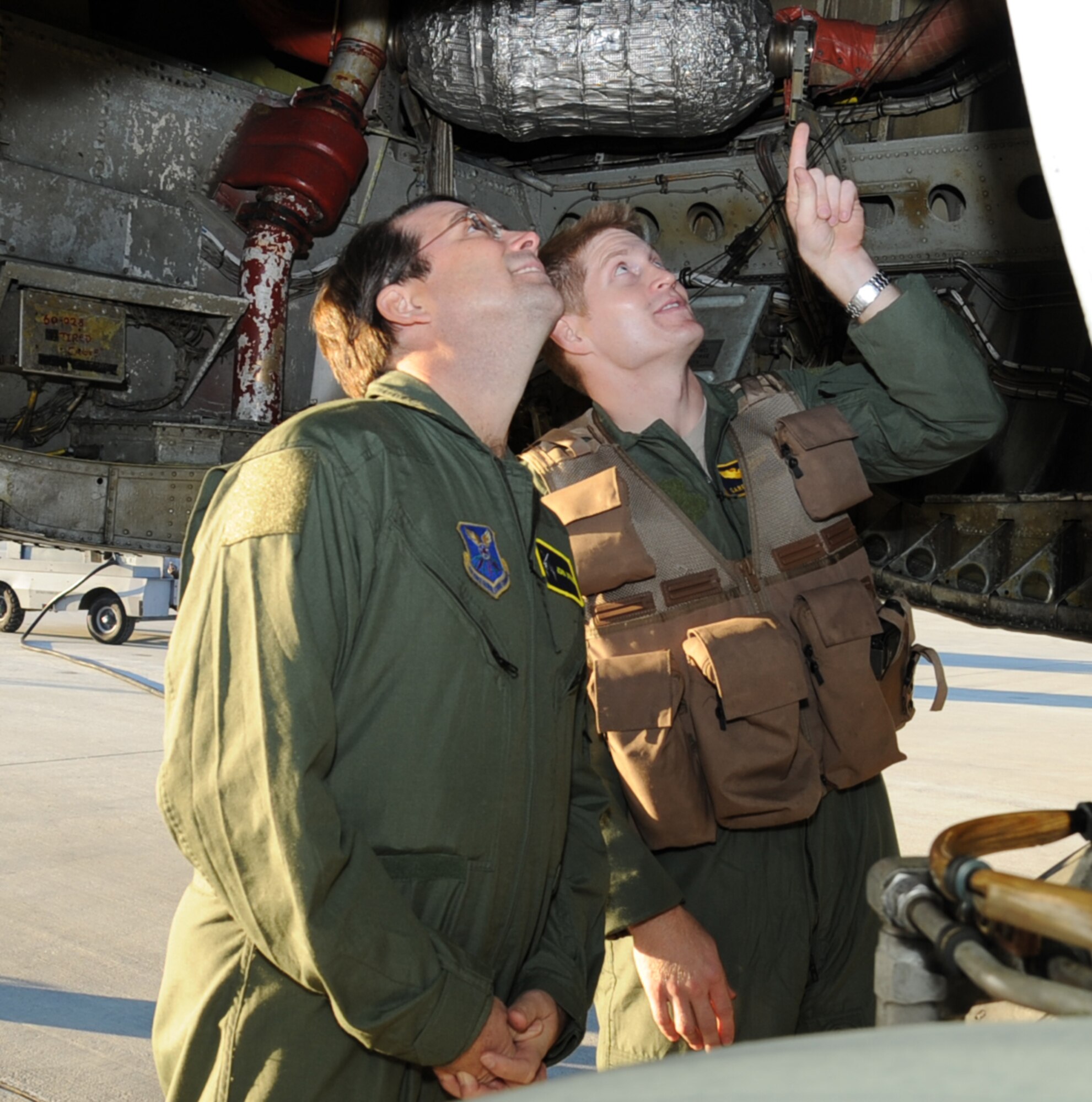 John Atkins (left), Shreveport-Bossier Military Affairs Council president, and Capt. Garrett Houk, 2nd Operations Support Squadron instructor pilot, inspect the inside of a wheel well of a B-52H Stratofortress on Barksdale Air Force Base, La., Nov. 28. The purpose of the orientation flight was to give him a deeper understanding of the full spectrum of Air Force Global Strike Command mission and an appreciation for the quality Airmen and civilians who protect the nation every day. (U.S. Air Force photo/Senior Airman Sean Martin)