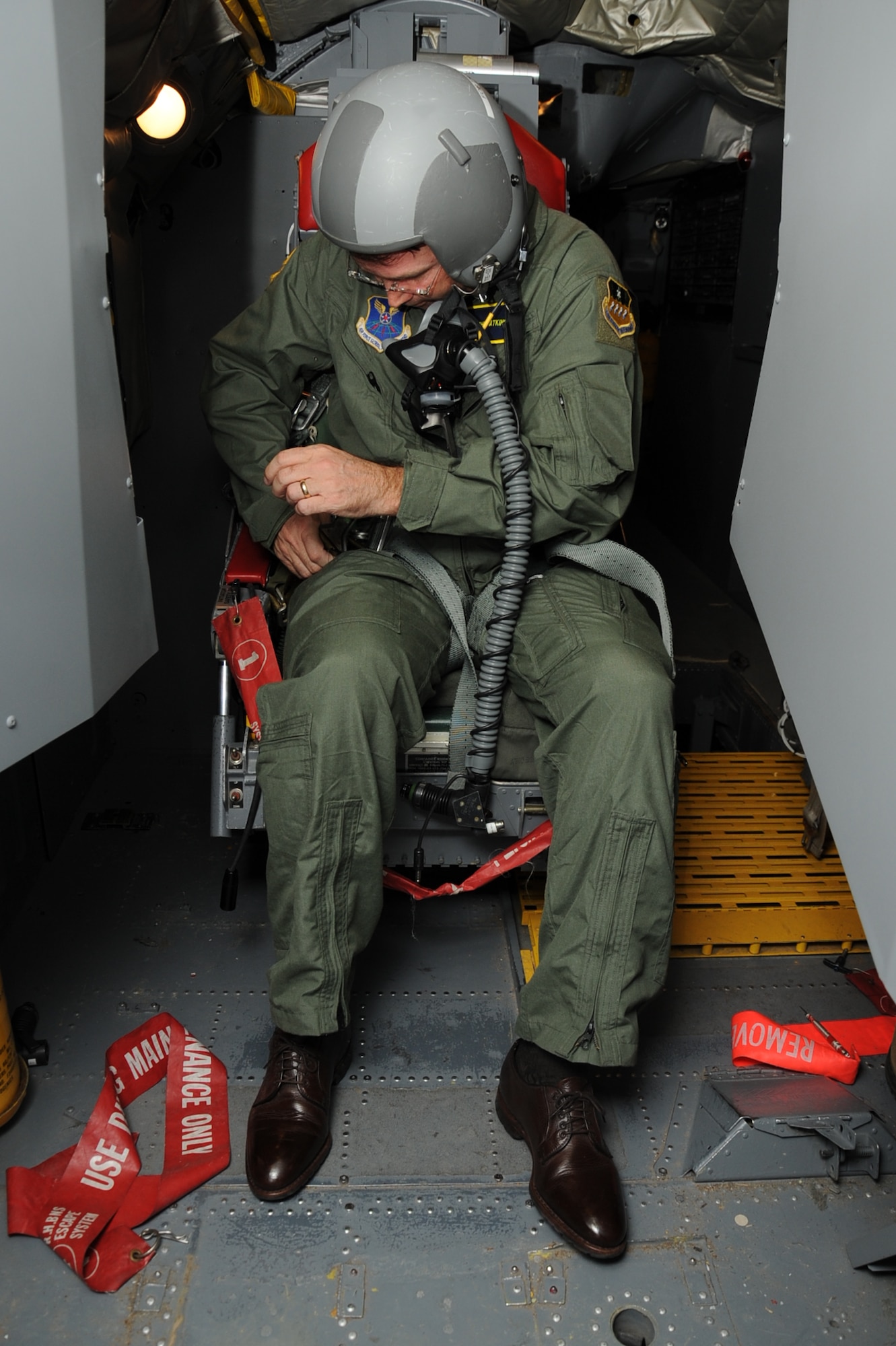 John Atkins, Shreveport-Bossier Military Affairs Council president, fastens his seatbelt in a simulated cockpit of a B-52H Stratofortress as part of an orientation flight on Barksdale Air Force Base, La., Nov. 27. The purpose of the flight was to give him a deeper understanding of the full spectrum of Air Force Global Strike Command mission and an appreciation for the quality Airmen and civilians who protect the nation every day. (U.S. Air Force photo/Senior Airman Sean Martin)