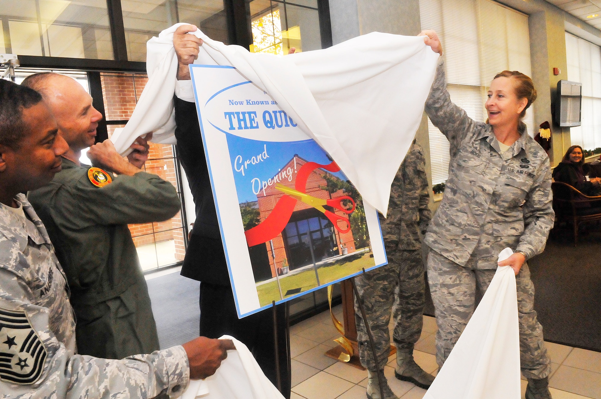 A grand opening and ribbon cutting was Tuesday for "The Quick Turn", the 78th Force Support Squadron’s newest food operation in Bldg. 2062. Maj. William Kerr, AFMC Installation Contracting Division deputy, submitted the winning name that was chosen from 590 entries. (U. S. Air Force photo/Sue Sapp)