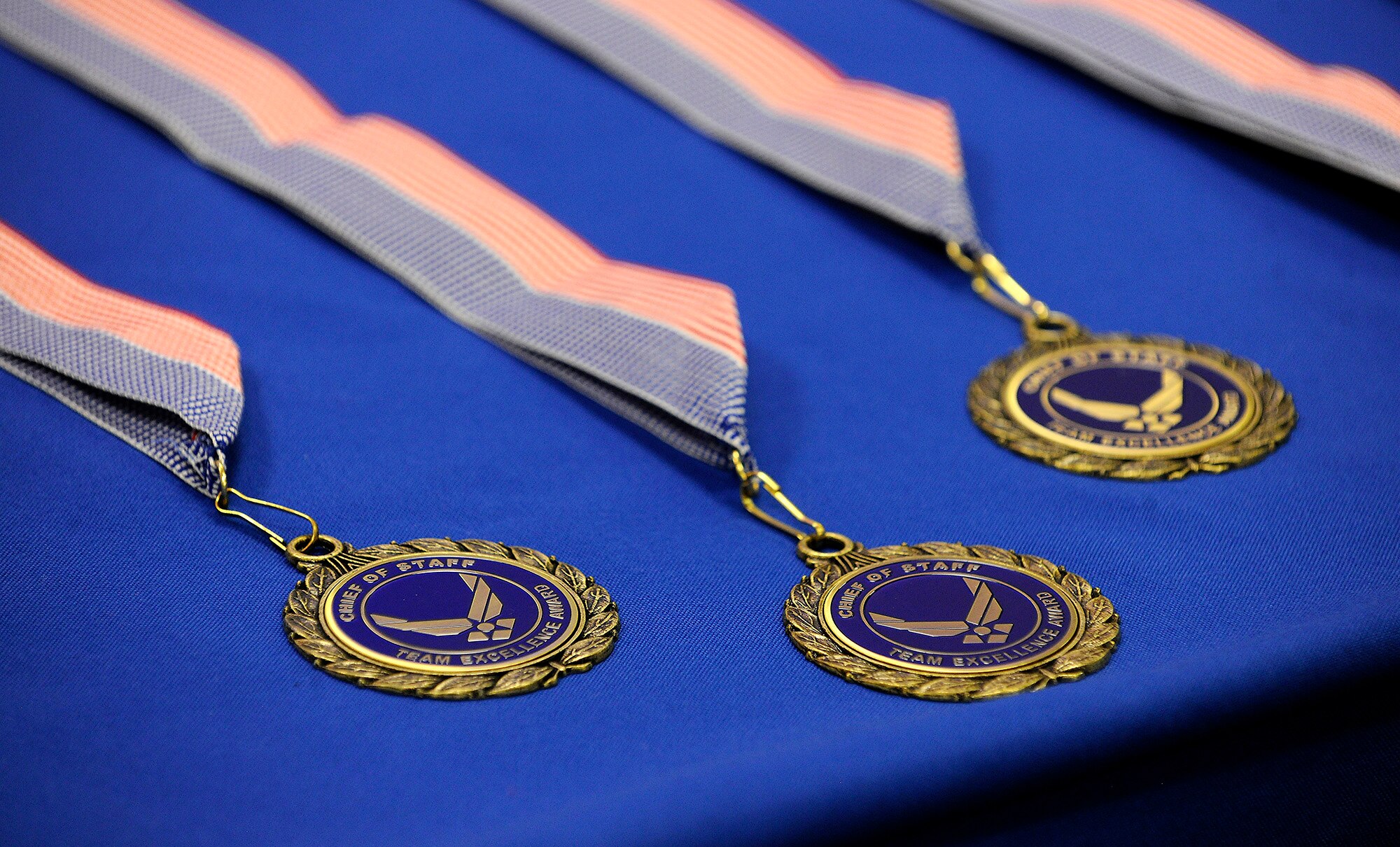 Medals await presentation to winning members honored during the Air Force Chief of Staff Team Excellence awards in a Pentagon ceremony on Nov. 27, 2012.  The three teams which made the finals and recognized today were the Electronic Flight Bag Team from Headquarters, Air Mobility Command at Scott Air Force Base, Ill.; Air Force Research Laboratory's Radar Relocation Project Management Team, from the 213th Engineering Installation Squadron in Newburgh, N.Y.; and the B-2 Window Change Continuous Process Improvement Team, from the 509th Aircraft Maintenance Group, from Whiteman Air Force Base, Mo.  (U.S. Air Force photo/Scott M. Ash)