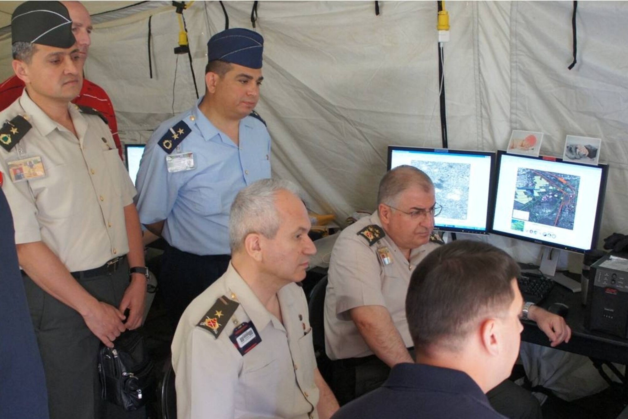 Eagle Vision team demonstrating the capabilities of the EV Ground Satellite Station to leaders within the Turkish Military.