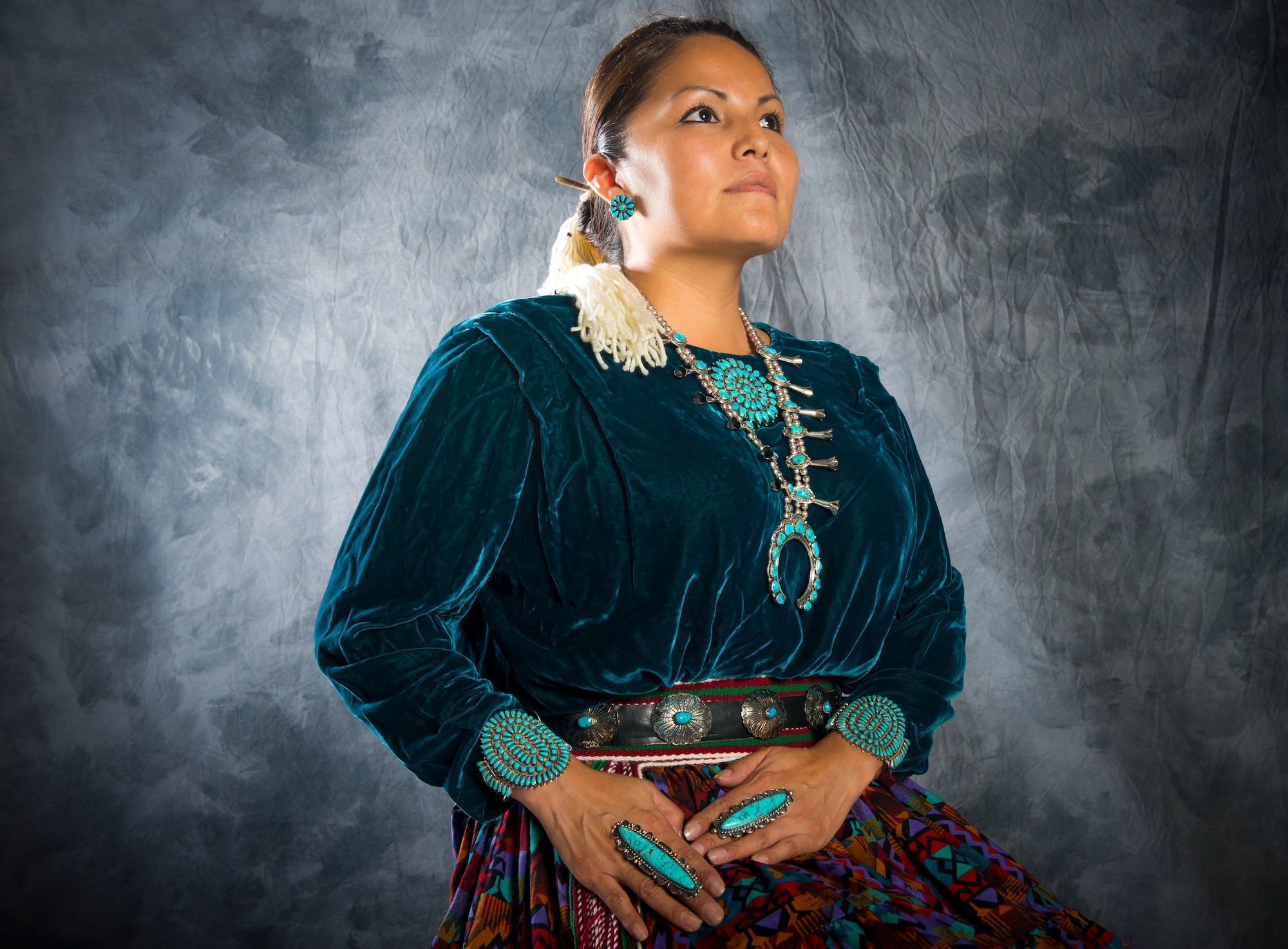 Tech. Sgt. April Cooper, 23d Wing command section superintendent, poses wearing her traditional Navajo dress at Moody Air Force Base, Ga., Nov. 27, 2012. November is Native American Heritage Month, which honors and celebrates the many contributions Native Americans have made and continue to make to the U.S. (U.S. Air Force photo/Senior Airman Douglas Ellis/Released) 
