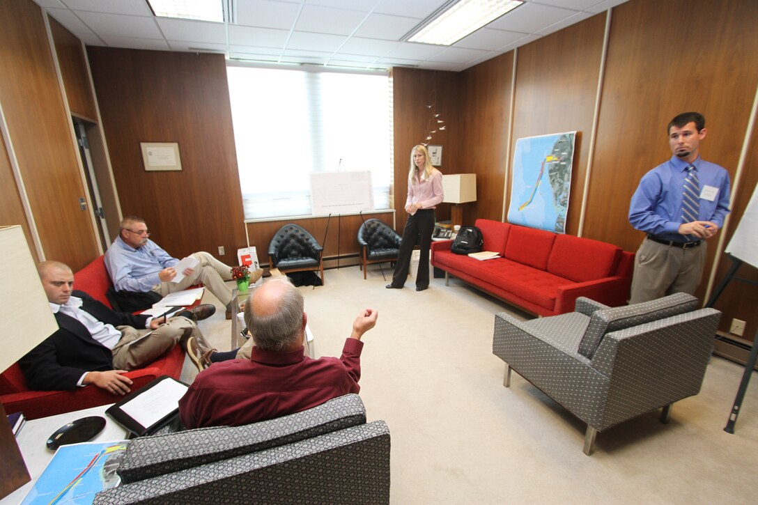 CAPE CHARLES, Va. -- Stakeholders work in breakout sessions with Corps of Engineers employees during a planning charrette Oct. 12, 2012. The town of Cape Charles wants to deepen their 18-foot navigation channel and approached the Norfolk District, U.S. Army Corps of Engineers for help. 