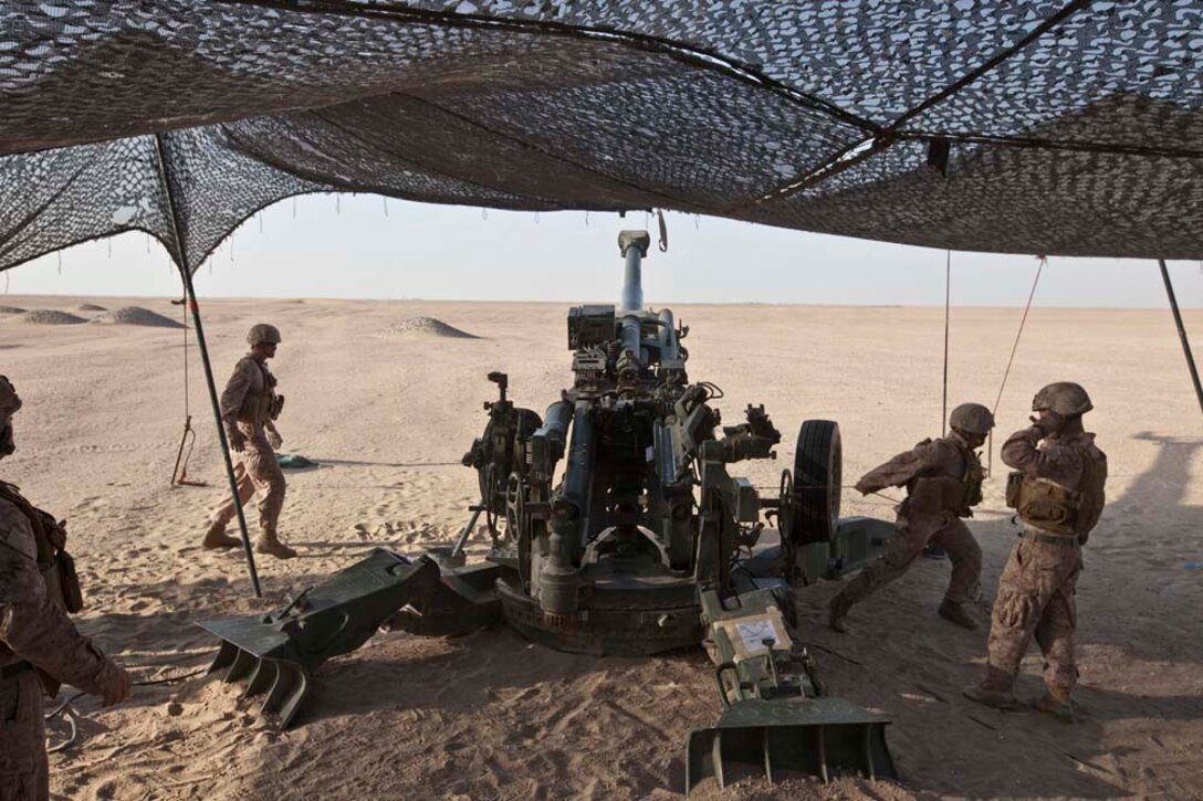 U.S. Marines with Bravo Battery, 1st Battalion, 11th Marine Regiment, 15th Marine Expeditionary Unit, fire the M777A2 Lightweight Howitzer as part of Eager Mace 13, aboard Forward Operating Base Sword, Kuwait November 14, 2012. The purpose of the exercise is to expand levels of cooperation, maritime capabilities, as well as promote long-term regional stability and interoperability between U.S. forces and regional partners. (U.S. Marine Corps photo by Cpl. Bobby J. Gonzalez/Not Reviewed)