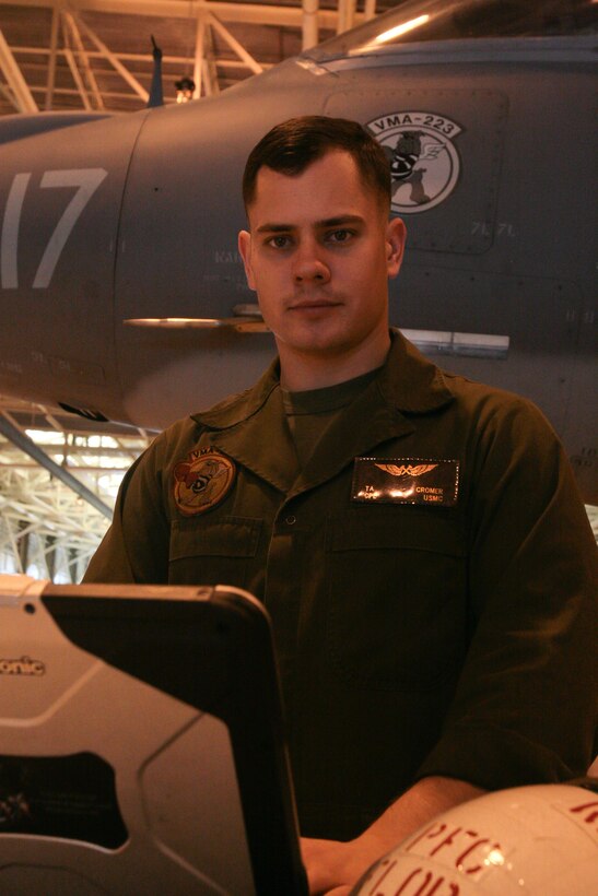 Timothy A. Cromer works in front of a Harrier on Nov. 20, at Cherry Point. Cromer is a fixed-wing airframe mechanic with Marine Fixed-Wing Attack Squadron 223.
