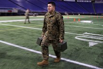 Staff Sgt. Jowa Wildes, 33, from Palmdale, Calif., completes the maneuver under fire portion of his combat fitness test at the Metrodome on Nov. 21. Wildes is the staff noncommissioned officer-in-charge of the Roseville, Minn., recruiting office. For additional imagery from the event, visit www.facebook.com/rstwincities.