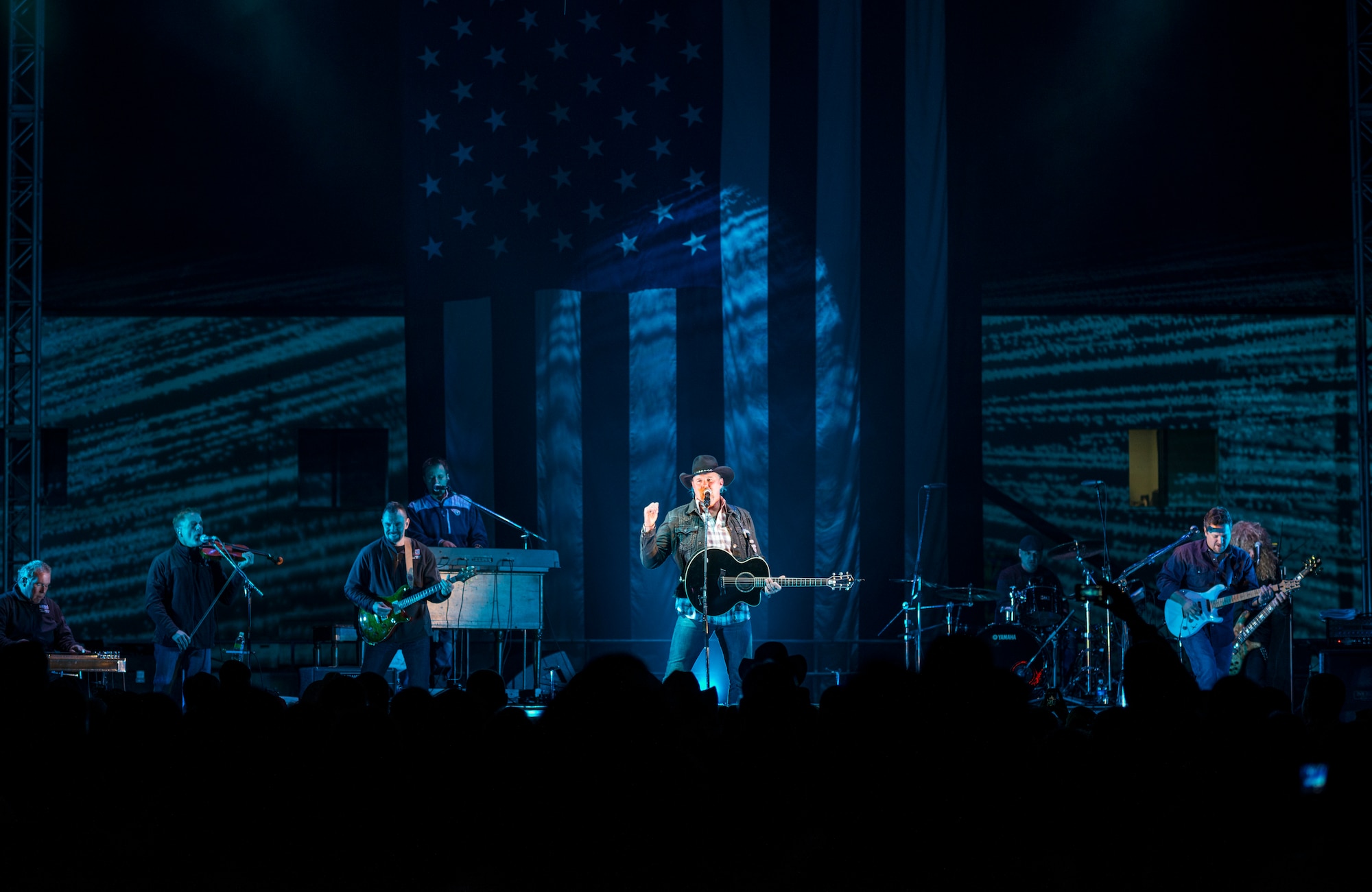 YOKOTA AIR BASE, Japan -- Trace Adkins and his band perform at Yokota Air Base, Japan, Nov. 27, 2012. The 374th Force Support Squadron and USO hosted the event to boost morale at Yokota. (U.S. Air Force photo by Tech. Sgt. Samuel Morse)