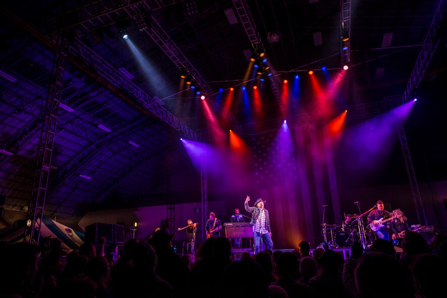 YOKOTA AIR BASE, Japan -- Trace Adkins sings his opening song at Yokota Air Base, Japan, Nov. 27, 2012. The 374th Force Support Squadron and USO hosted the event to boost morale at Yokota. (U.S. Air Force photo by Tech. Sgt. Samuel Morse)
