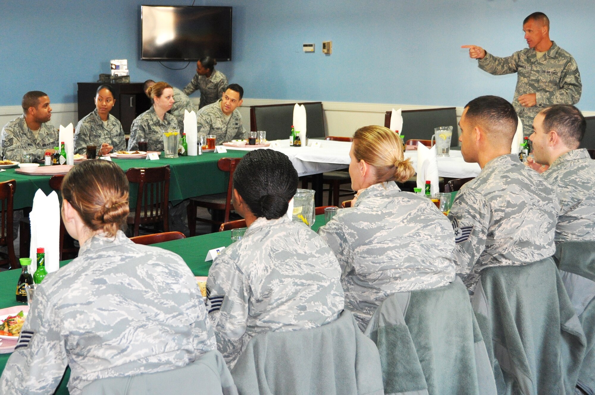 Chief Master Sgt. Steve McDonald, Pacific Air Forces command chief, speaks with a group of Osan Air Base NCOs at the Pacific House dining facility, Nov. 29, 2012. During the lunch, the chief received feedback from the group about the concerns they had with the Air Force. McDonald also stressed the importance of handling key issues within their units and encouraged them to be a propeller for change. (U.S. Air Force photo/Senior Airman Kristina Overton) 