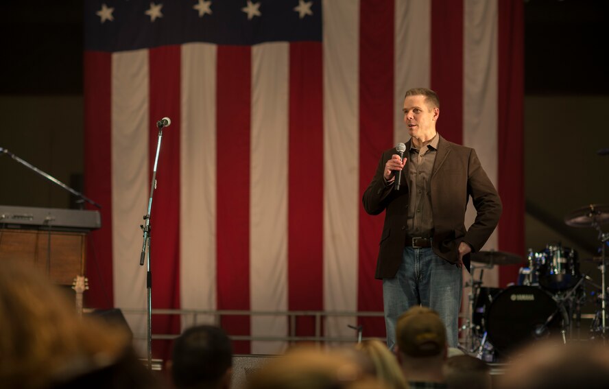 YOKOTA AIR BASE, Japan -- Col. Chip Brown, 374th Airlift Wing vice commander, introduces Trace Adkins at the beginning of a performance at Yokota Air Base, Japan, Nov. 27, 2012. The 374th Force Support Squadron and USO hosted the event to boost morale at Yokota. (U.S. Air Force photo by Tech. Sgt. Samuel Morse)