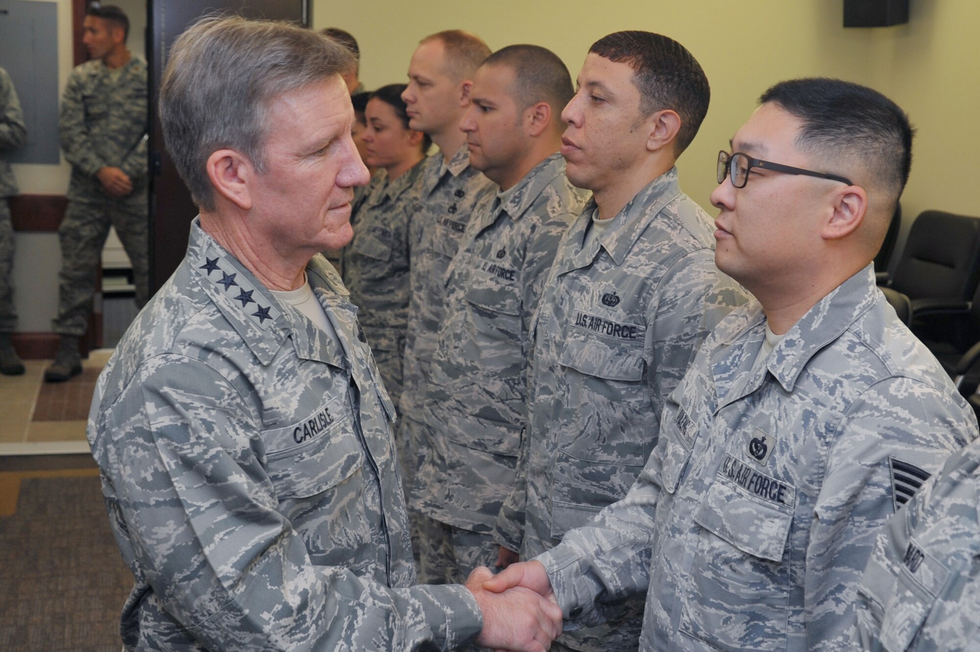 Gen. Herbert J. Carlisle, Pacific Air Forces commander, recognizes outstanding performers from 7th Air Force during his visit to Osan Air Base, Republic of Korea, Nov. 29, 2012. This is Carlisle’s first visit to Osan Air Base since assuming command in August. PACAF is responsible for Air Force activities spread over half the globe in a command that supports 45,000 Airmen serving principally in Japan, Korea, Hawaii, Alaska and Guam. (U.S. Air Force photo/Staff Sgt. Craig Cisek)