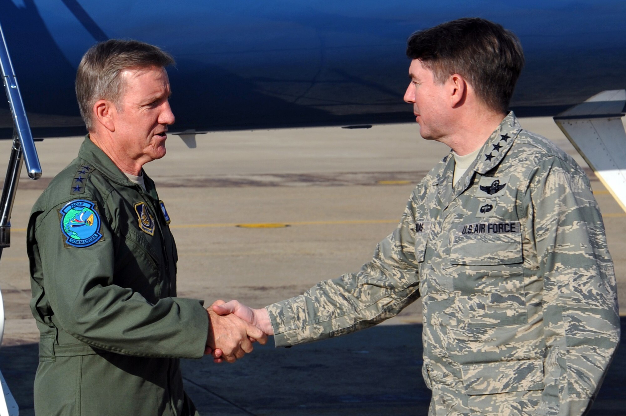 Lt. Gen. Jan-Marc Jouas (right), 7th Air Force commander, welcomes Gen. Herbert J. Carlisle, Pacific Air Forces commander, to Osan Air Base, Republic of Korea, Nov. 27, 2012. This is Carlisle’s first visit to Osan since assuming command in August. (U.S. Air Force photo/Staff Sgt. Craig Cisek)
