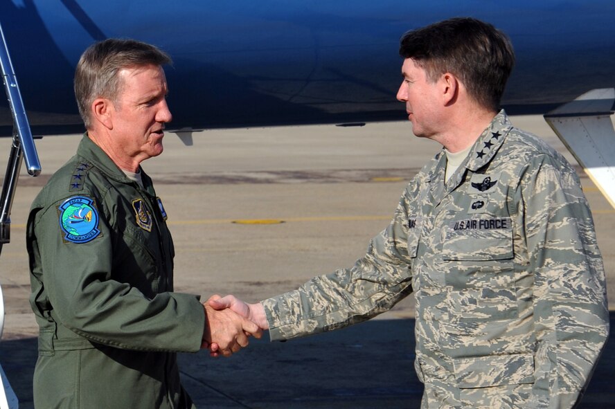 Lt. Gen. Jan-Marc Jouas (right), 7th Air Force commander, welcomes Gen. Herbert J. Carlisle, Pacific Air Forces commander, to Osan Air Base, Republic of Korea, Nov. 27, 2012. This is Carlisle’s first visit to Osan since assuming command in August. (U.S. Air Force photo/Staff Sgt. Craig Cisek)