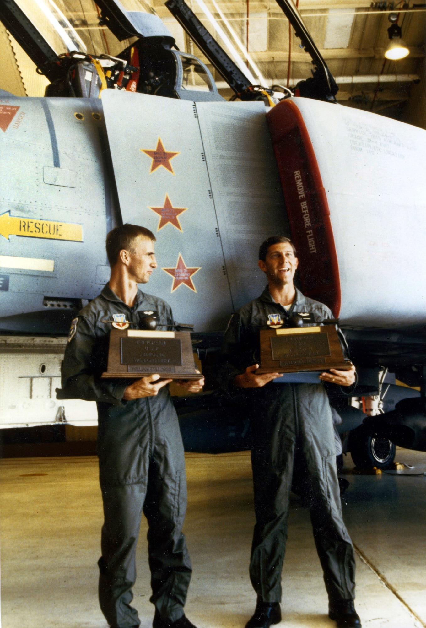 Oregon Air National 1st Lt. Gary Thompson (left) and  Capt. (ret.) Dave McKinney (right) pose with an F-4C and their awards after they returned to the Portland Air National Guard Base, Portland, Ore. in August of 1988. McKinney and Thompson won the Top Gun and Top Shooter awards at the 1988 William Tell Weapons meet at Tyndall AFB, Fla. (photo courtesy of Gary Thompson)