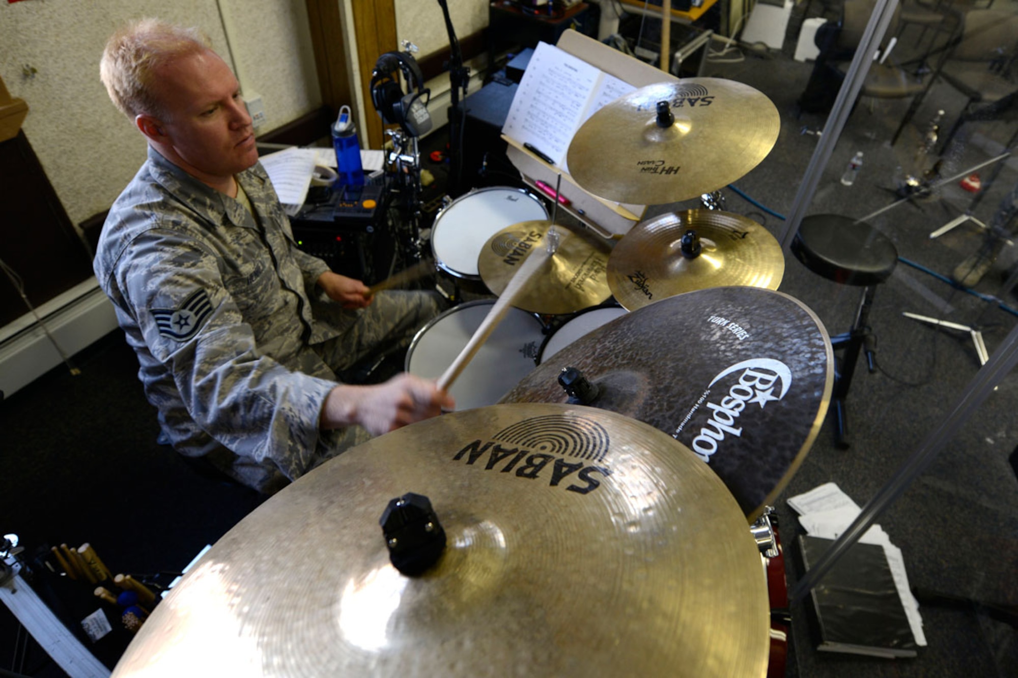 Air Force Staff Sgt. Mike Henrie rehearses songs, Nov. 20, for “Sounds of the Season,” an annual holiday concert hosted at the Atwood Concert Hall in December. He is assigned to the U.S. Air Force Band of the Pacifi c, Alaska, at JBER. (U.S. Air Force photo/Tammie J. Ramsouer)