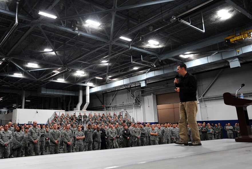 Guest speaker Brian Flemming, former U.S. Army infantryman injured in Afghanistan, speaks to hundreds of Offutt Airmen inside of the Bennie Davis Maintenance Facility’s Dock 1 at Offutt Air Force Base Neb., Nov. 26. He spoke about the obstacles that he has endured through years of continued combat and overcoming injuries and the deaths of colleagues.  (U.S. Air Force photo by Josh Plueger/Released)