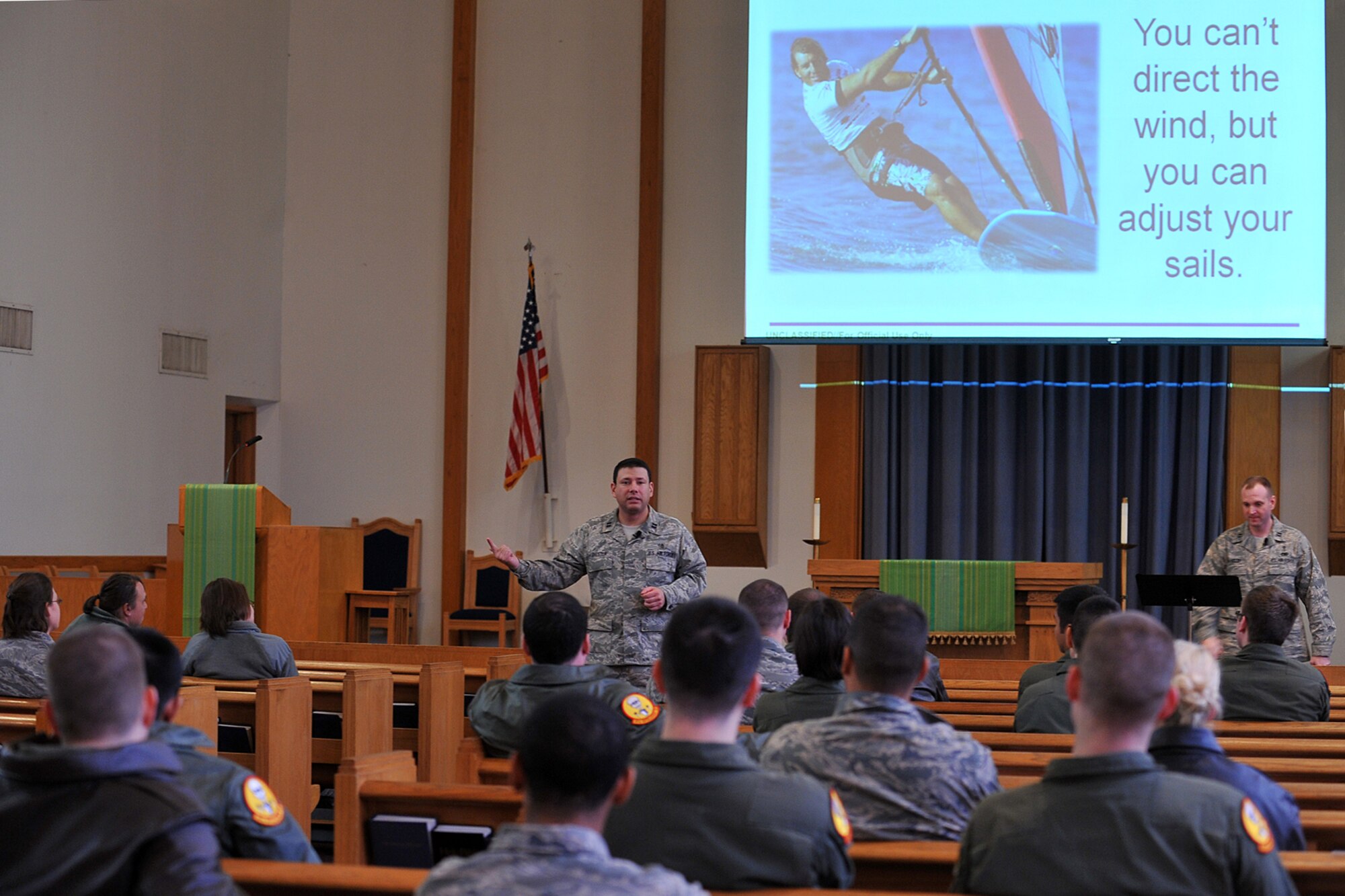 U.S. Air Force Capt. Mark Edelstein, a 55th Wing chaplain, addresses Team Offutt members during Wingman Day in the SAC Chapel on Offutt Air Force Base, Neb., 26. Team Offutt members took part in various events and briefings during the day to promote teamwork and educate Airmen on topics such as suicide prevention and the dangers of drinking and driving. (U.S Air Force photo by Charles Haymond/Released)