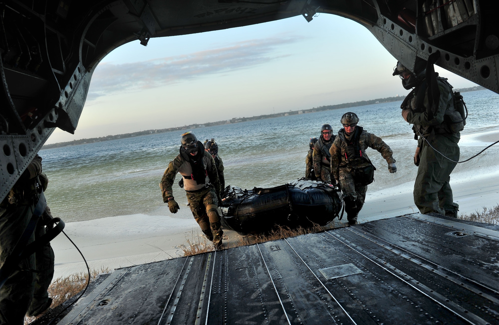 U.S. Air Force Special Operations Weather Teams participate in a training scenario on a CH-47 Chinook during Emerald Warrior, Hurlburt Field, Fla., March 7, 2012. The primary purpose of Emerald Warrior is to exercise special operations components in urban and irregular warfare settings to support combatant commanders in theater campaigns. Emerald Warrior leverages lessons from Operation Iraqi Freedom, Operation Enduring Freedom, and other historical lessons to provide better trained and ready forces to combatant commanders. (photo by Staff Sgt. Clay Lancaster)