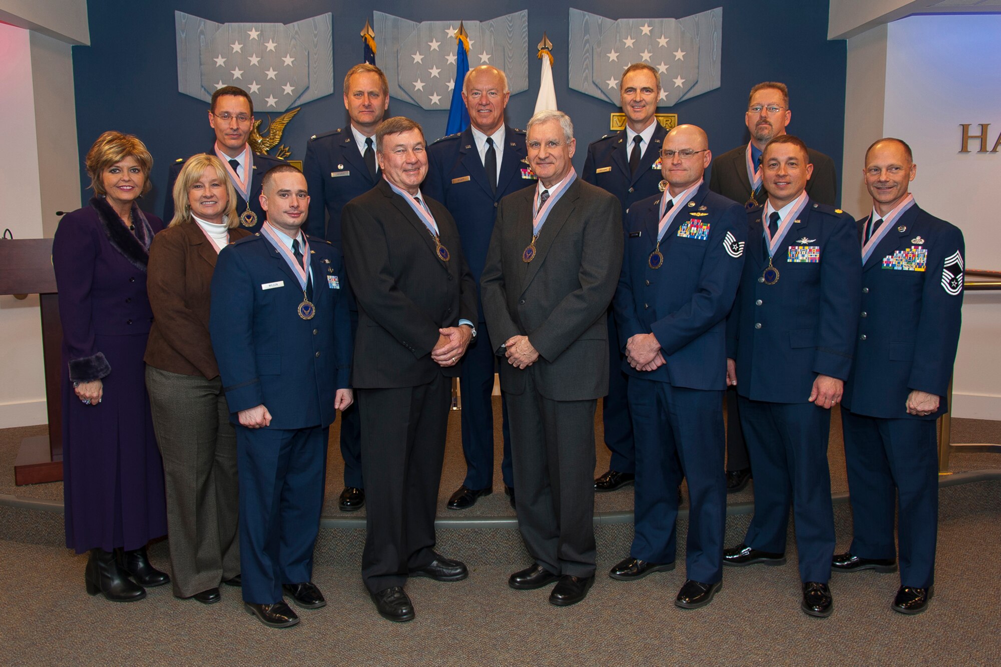 Air National Guard leaders pose for a group photo with the Air National Guard Total Force BRAC Radar Relocation Team in the Hall of Heroes at the Pentagon, Arlington, Va., Tuesday, 27 Nov., 2012. The team was honored for their work in executing a BRAC requirement to consolidate the Air Force Research Labs, based in Rome, N.Y. with the AFRL Laboratory based at Wright-Patterson AFB, Oh. For their efforts, the team saved over $25 million and earned first runner up honors for the 2012 Chief of Staff Team Excellence awards. (National Guard photo by Master Sgt. Marvin Preston/RELEASED)