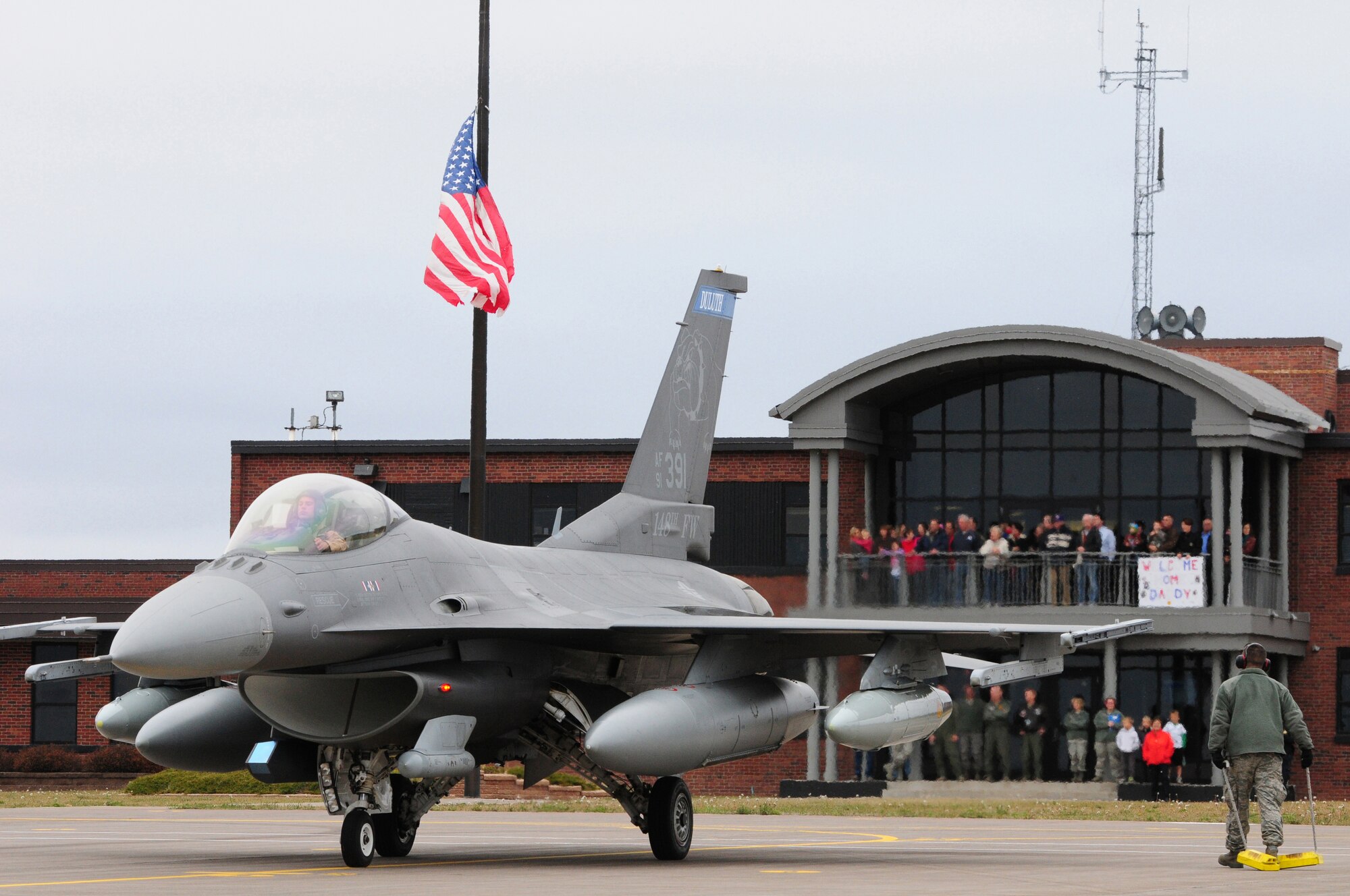 A 148th Fighter Wing Block 50 F-16C Fighting Falcon aircraft taxis to its parking spot at the Duluth Air National Guard Base after returning from Kandahar Airfield, Afghanistan, Oct. 22, 2012.  The 148th Fighter Wing, Minnesota Air National Guard, deployed approximately 300 airmen to Afghanistan in August, 2012 in support of Operation Enduring Freedom.  (National Guard photo by Tech. Sgt. Brett R. Ewald/ Released)