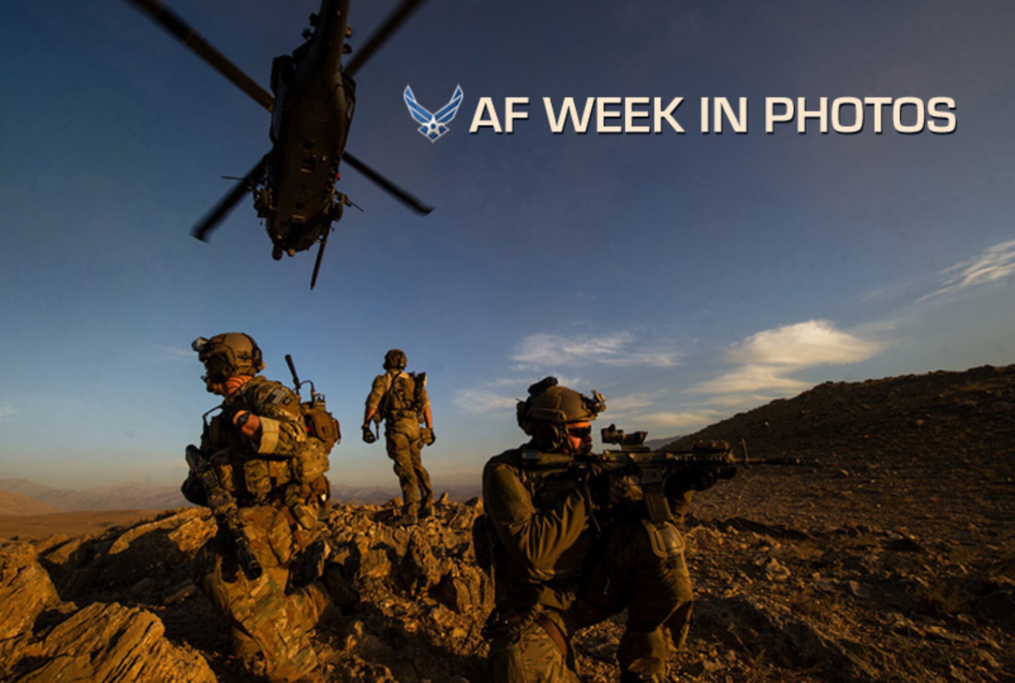 Pararescuemen with the 83rd Expeditionary Rescue Squadron secure the area after being lowered from an HH-60 Pave Hawk during a mission in Afghanistan on Nov. 7, 2012. (U.S. Air Force photo/Staff Sgt. Jonathan Snyder) 