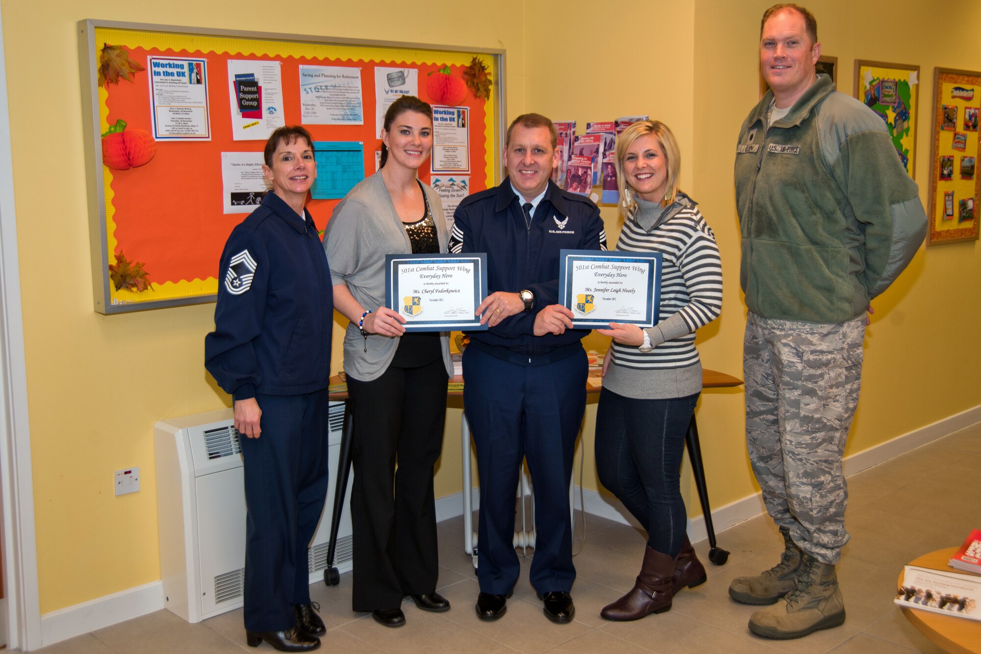RAF CROUGHTON, United Kingdom -- Cheryl Fedorkowicz and Jennifer Leigh Heatly, 422nd Air Base Squadron Airman and Family Readiness Annex, were named November’s 501st CSW Everyday Hero from the 422nd ABG. 

Fedorkowicz, the Community Readiness coordinator, and Heatly, the Family Services coordinator, run the annex. In any given month, the coordinators host a number of briefings and issue Air Force Aid vouchers for PCS child care and car care. They also loan temporary kitchen and household items to in- and outbound residents of RAF Croughton. (U.S. Air Force photo by Staff Sgt. Brian Stives)
