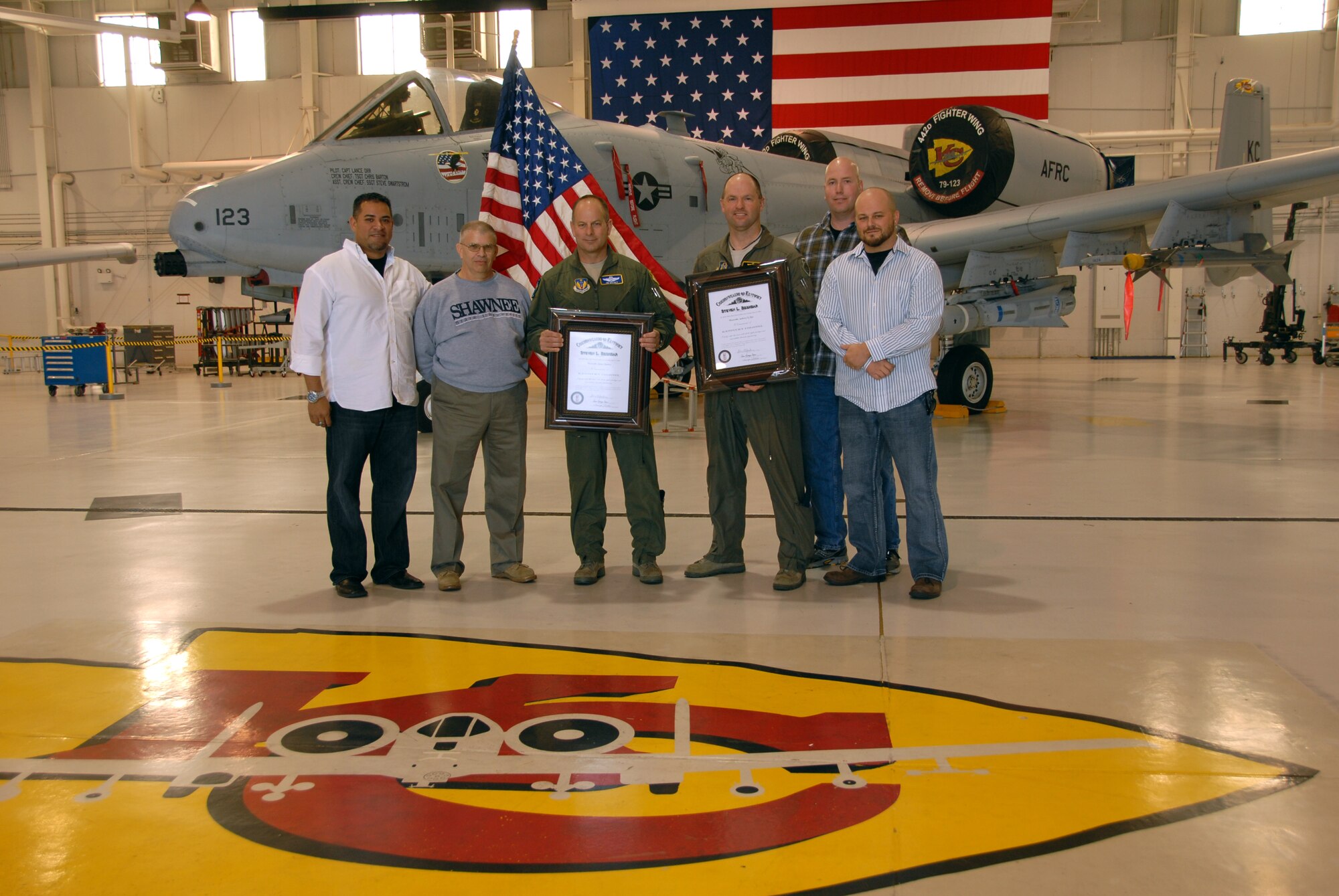 Col. James Mackey and Lt. Col. Anthony Roe met four soldiers for whom the A-10 saved their lives during a mission in Afghanistan in 2008. The soldiers, part of the Kentucky National Guard, traveled to Missouri to thank the pilots who flew the mission that day. The pilots are assigned to the 442nd Fighter Wing, an A-10 Thunderbolt II Air Force Reserve unit at Whiteman Air Force Base, Mo. (U.S. Air Force photo by Staff Sgt. Lauren Padden/Released)