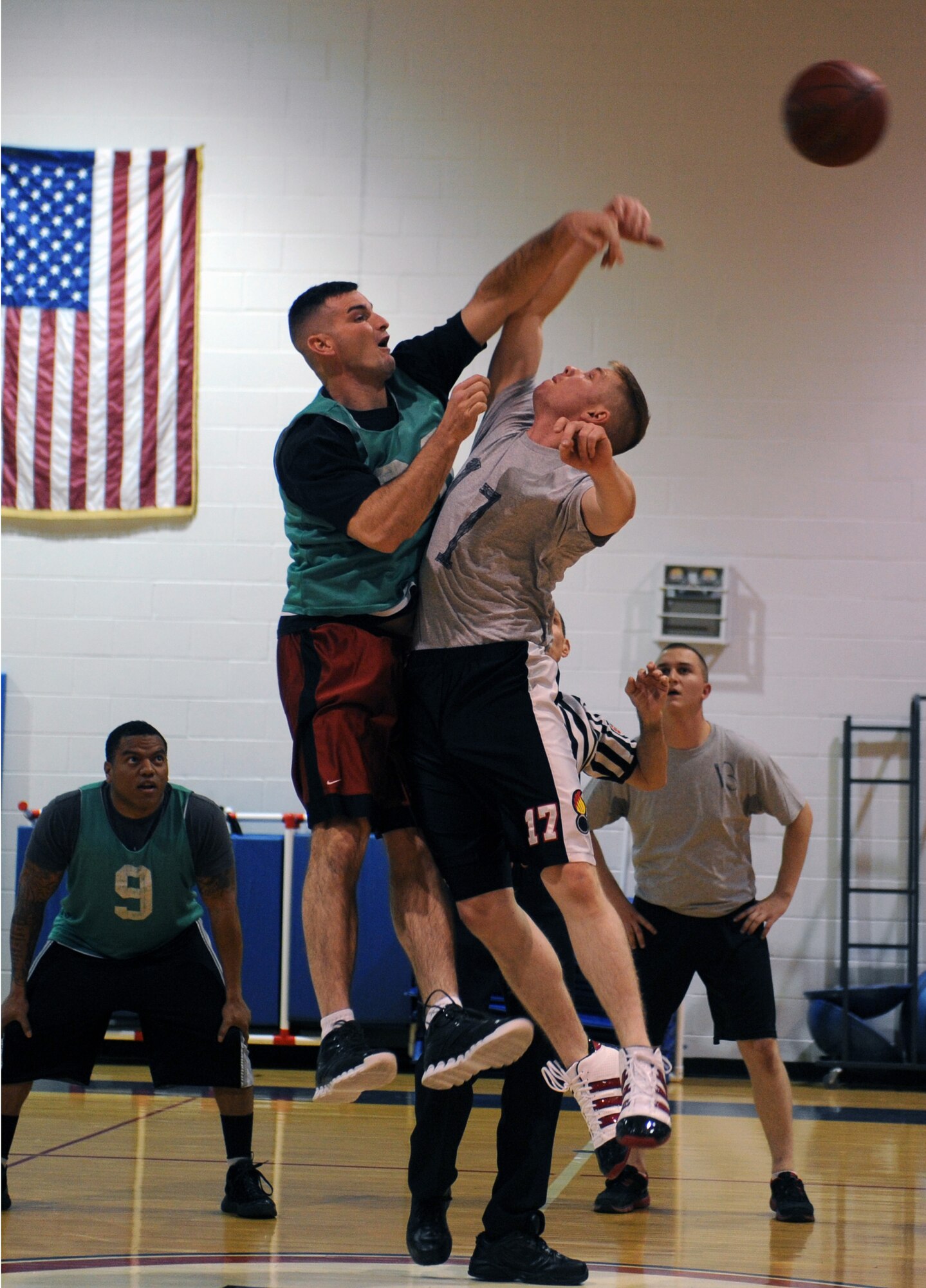 The 2012 Intramural Basketball season began Nov. 26. In their opening game, the 509th Operations Support Squadron defeated the 23rd Fighter Group, 60-49, at the Fitness Center Nov. 27 at Whiteman Air Force Base, Mo.(U.S. Air Force photo/Airman 1st Class Bryan Crane) (Released)