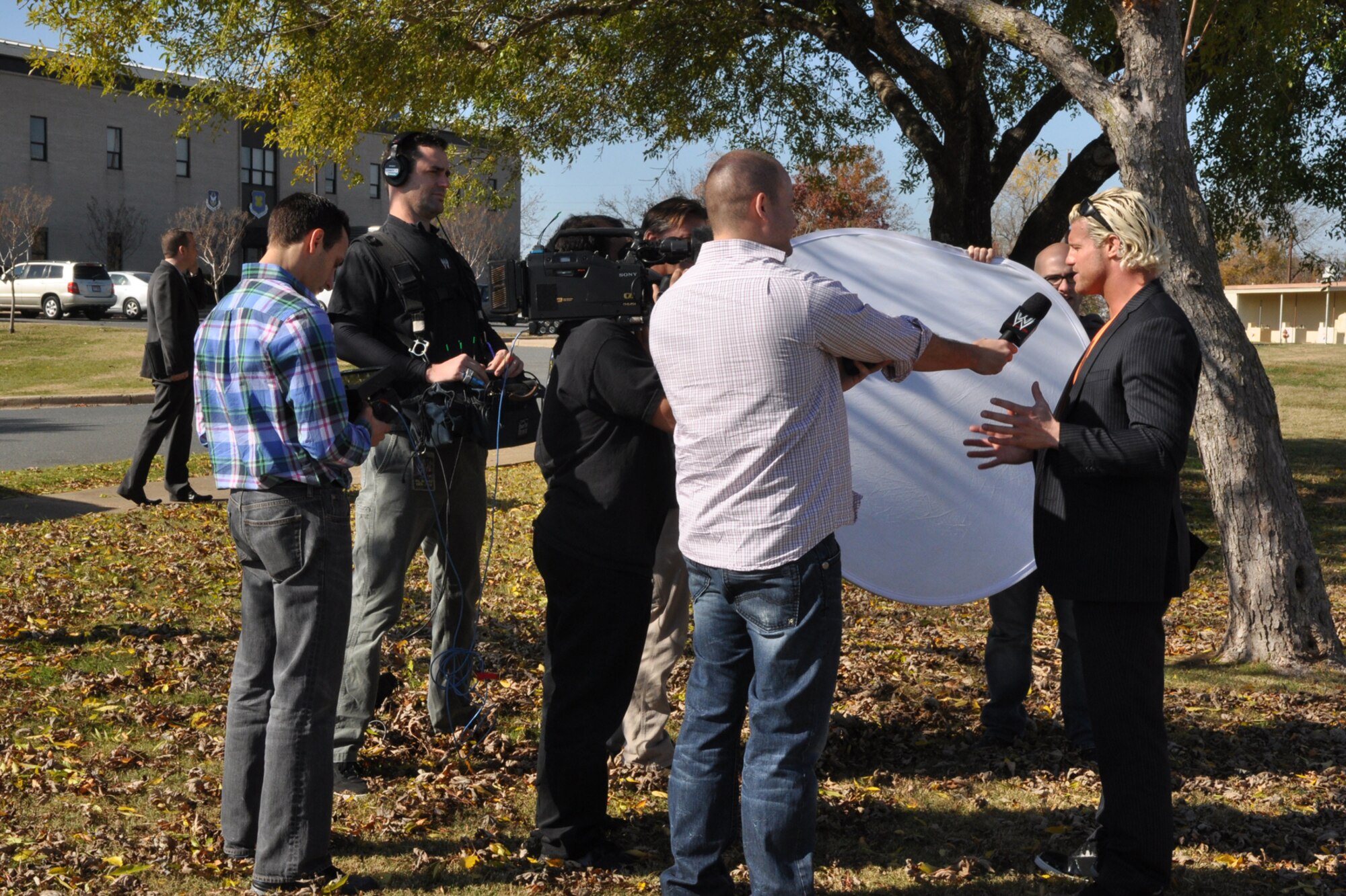 WWE’s Smackdown Superstar Dolph Ziggler, does an on camera interview for a WWE media team in front of the 307th Bomb Wing Headquarters’ building at Barksdale Air Force Base, La., Nov. 27, 2012. WWE brought Smackdown to the CenturyLink Center in Bossier City, La., Nov. 27, and Ziggler asked to come to Barksdale to meet with the “troops.” Military members were invited to see the event free of charge. (U.S. Air Force photo by Master Sgt. Jeff Walston)