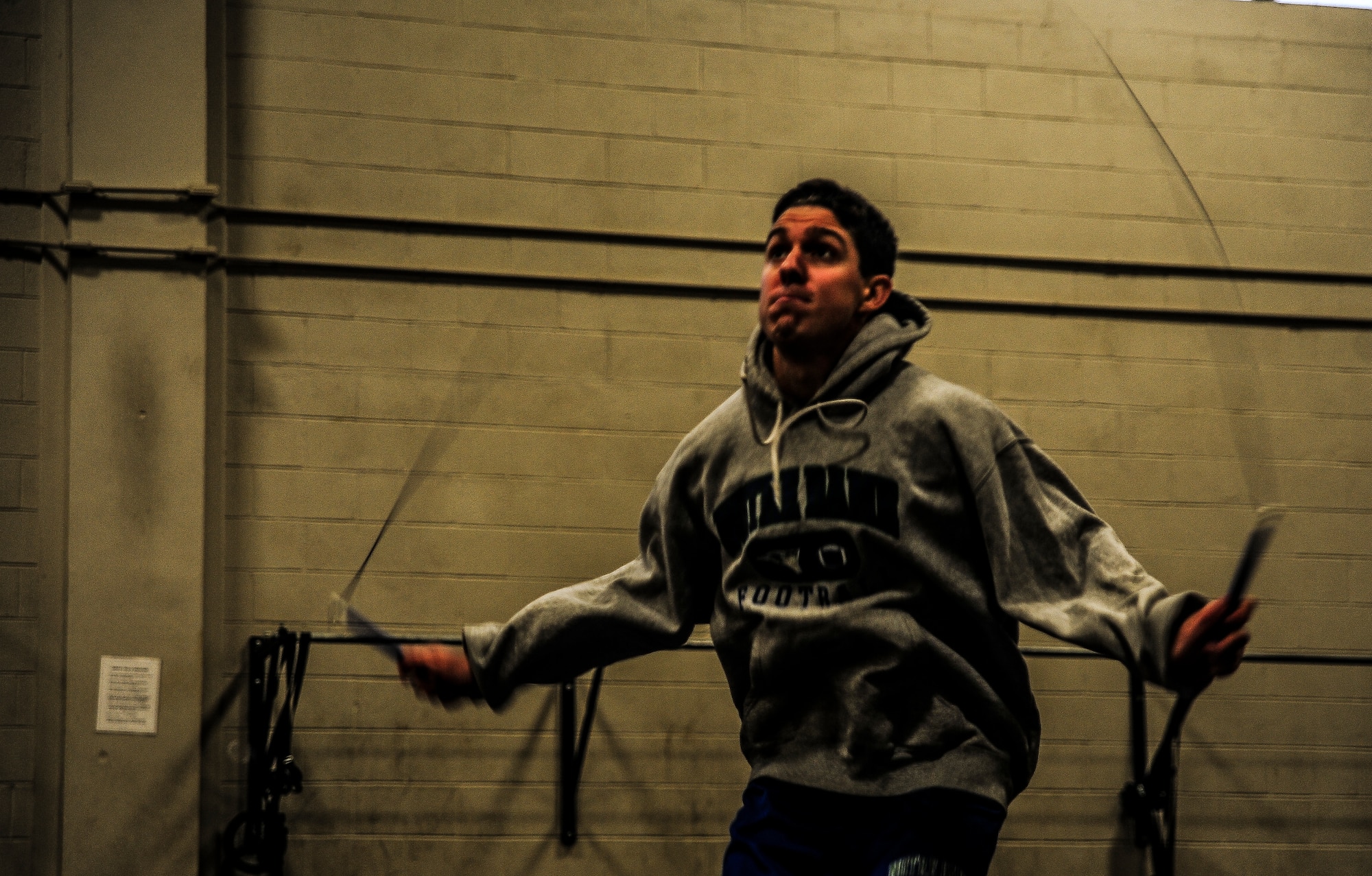 Lt. j.g. John Campion, Naval Nuclear Power Training Command student, jump ropes at the beginning of a CrossFit class Nov. 19, 2012, at the Joint Base Charleston – Air Base Fitness Center. Campion, along with several other service members and dependents from JB Charleston attend the daily CrossFit classes to stay in shape throughout the year. (U.S. Air Force photo/ Senior Airman Dennis Sloan)