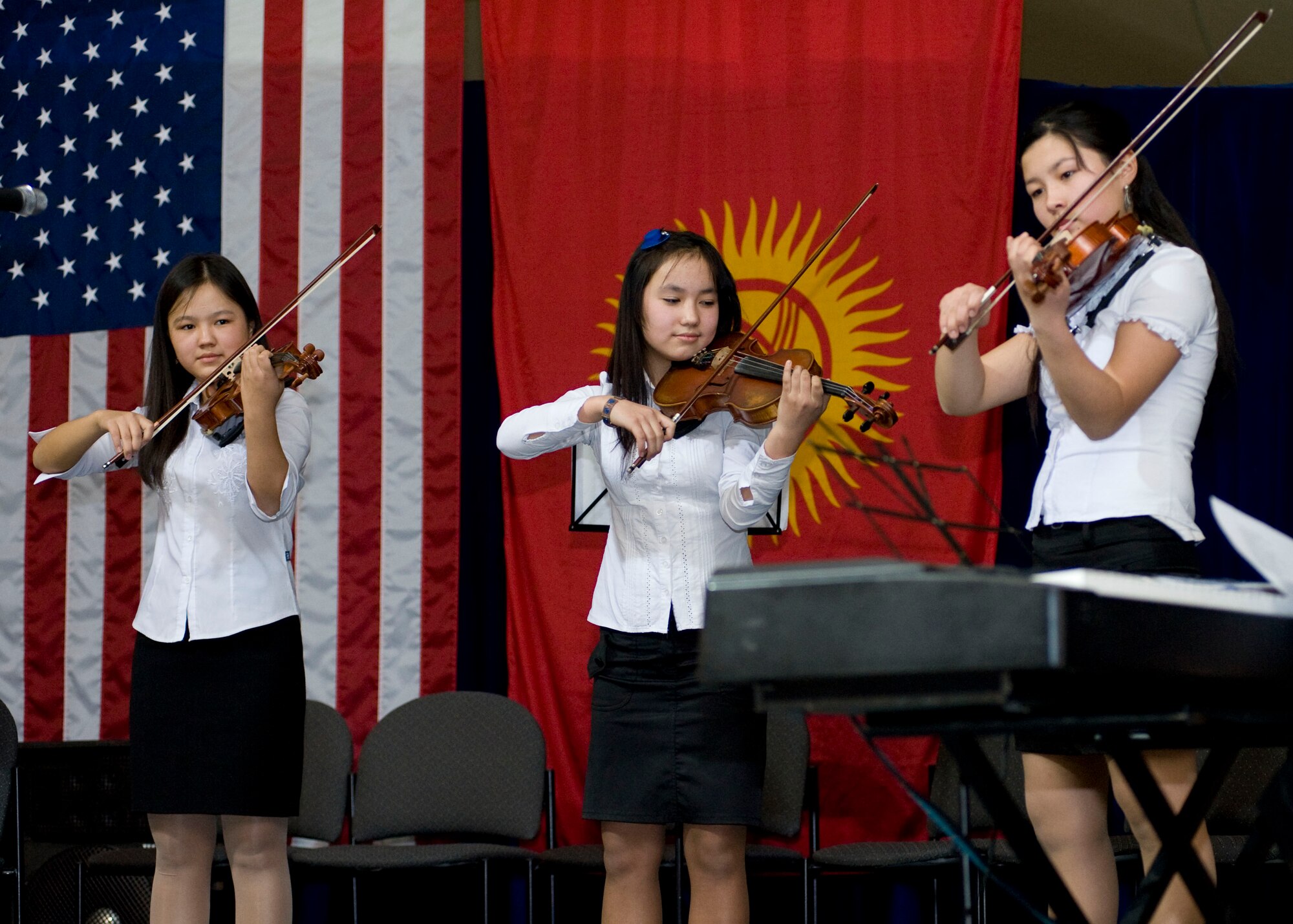 Students from the Mukash Abdraev National School of Music perform at the Transit Center at Manas, Kyrgyzstan, Nov. 27, 2012.  Displaying their musical skills in instruments ranging from woodwinds to strings, the students treated audience members to a musical medley including traditional Kyrgyz songs.  