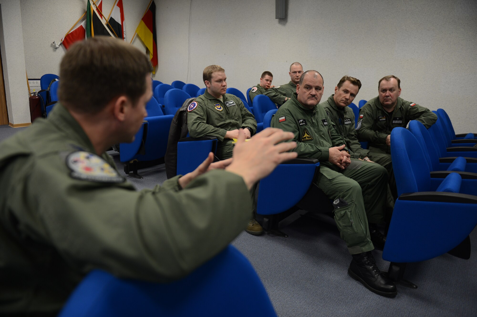 SPANGDAHLEM AIR BASE, Germany – Polish air force leadership listen during a briefing inside the 480th Fighter Squadron Nov. 26, 2012.  The briefing was part of a two-day tour for leadership from the Polish air force to visit Spangdahlem AB with hopes of strengthening the enduring partnership between NATO allies. (U.S. Air Force photo by Airman 1st Class Gustavo Castillo/Released)